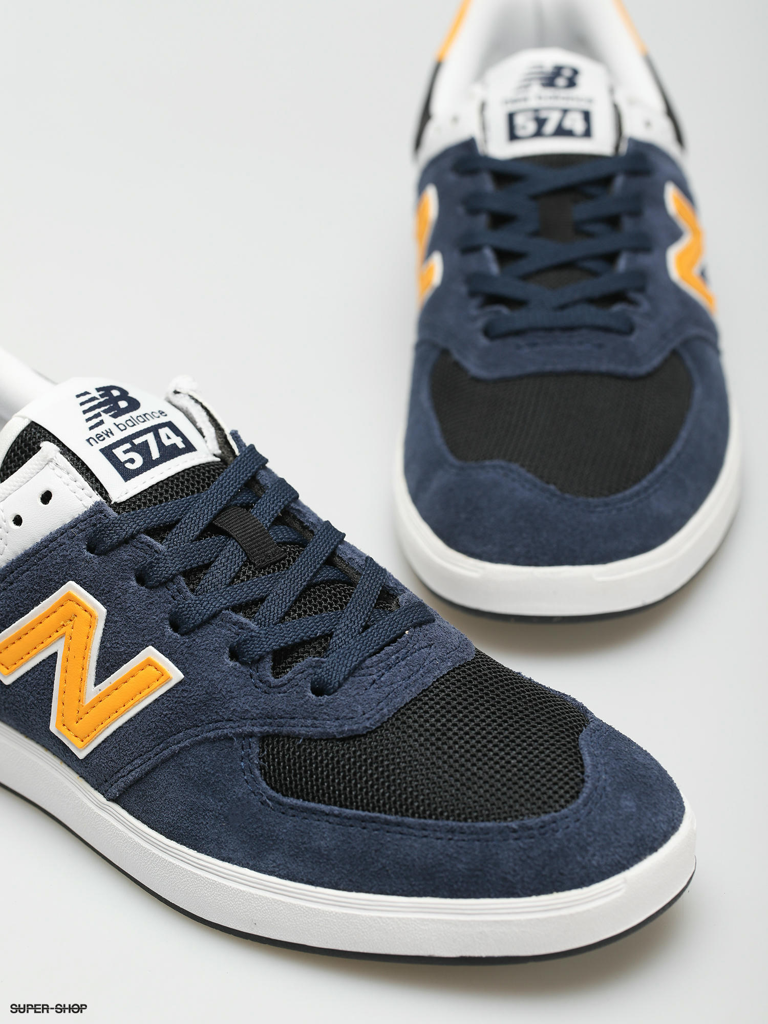 new balance 574 navy blue and yellow