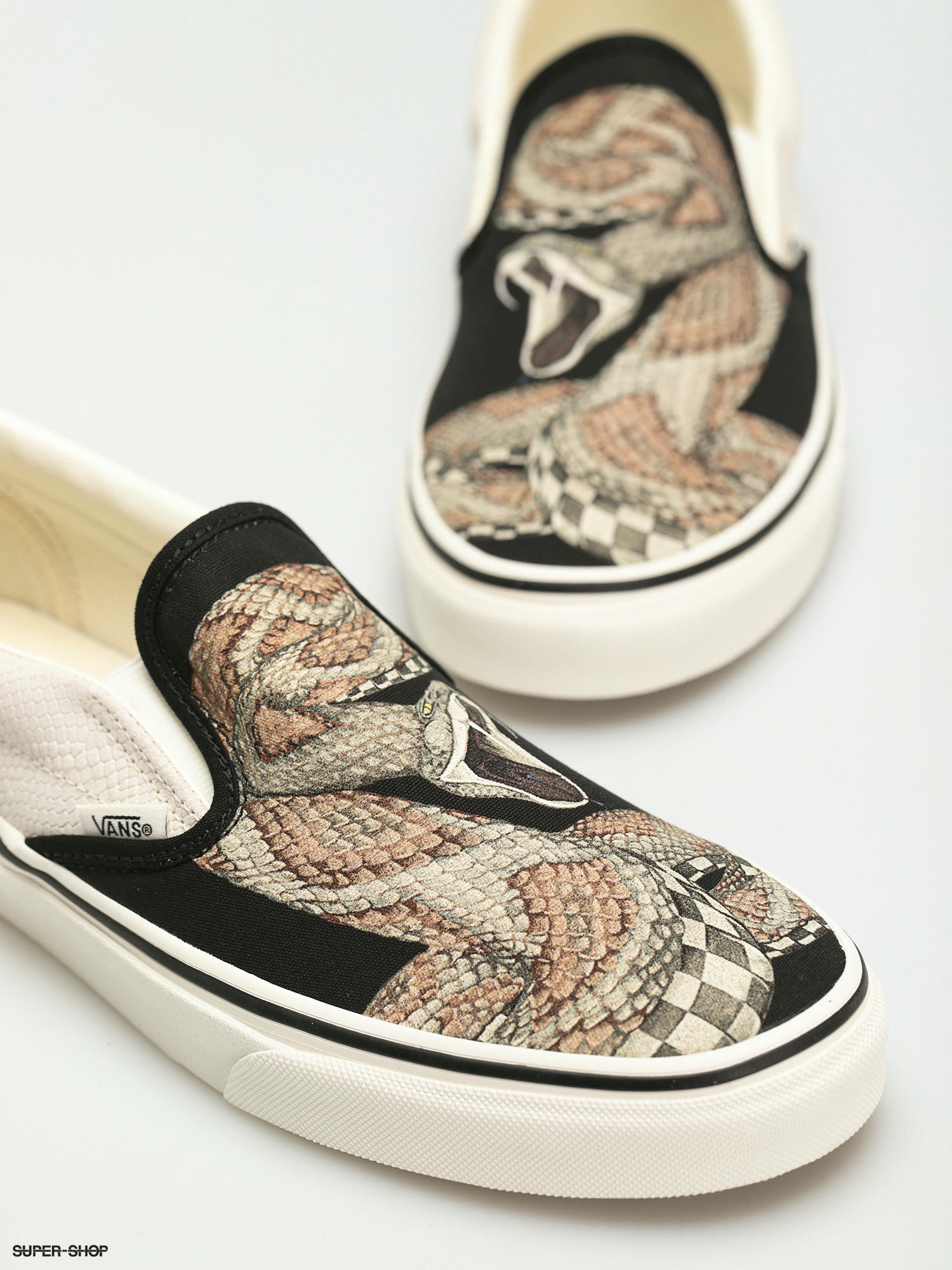 Snakeskin vans hot sale slip ons