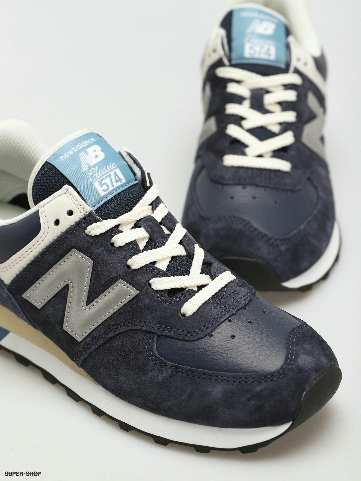 new balance 574 navy leather