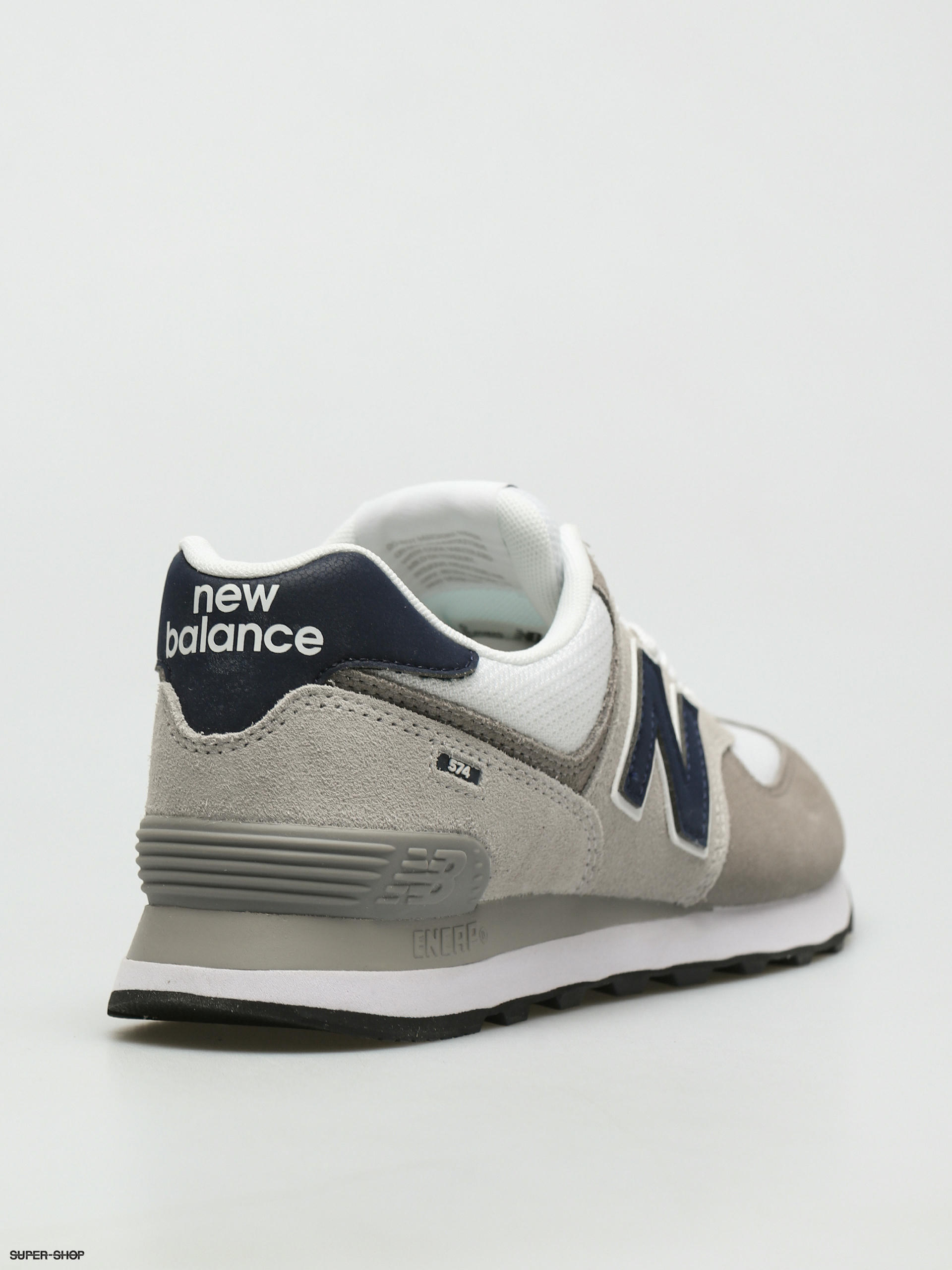 new balance 574 sneakers in light gray