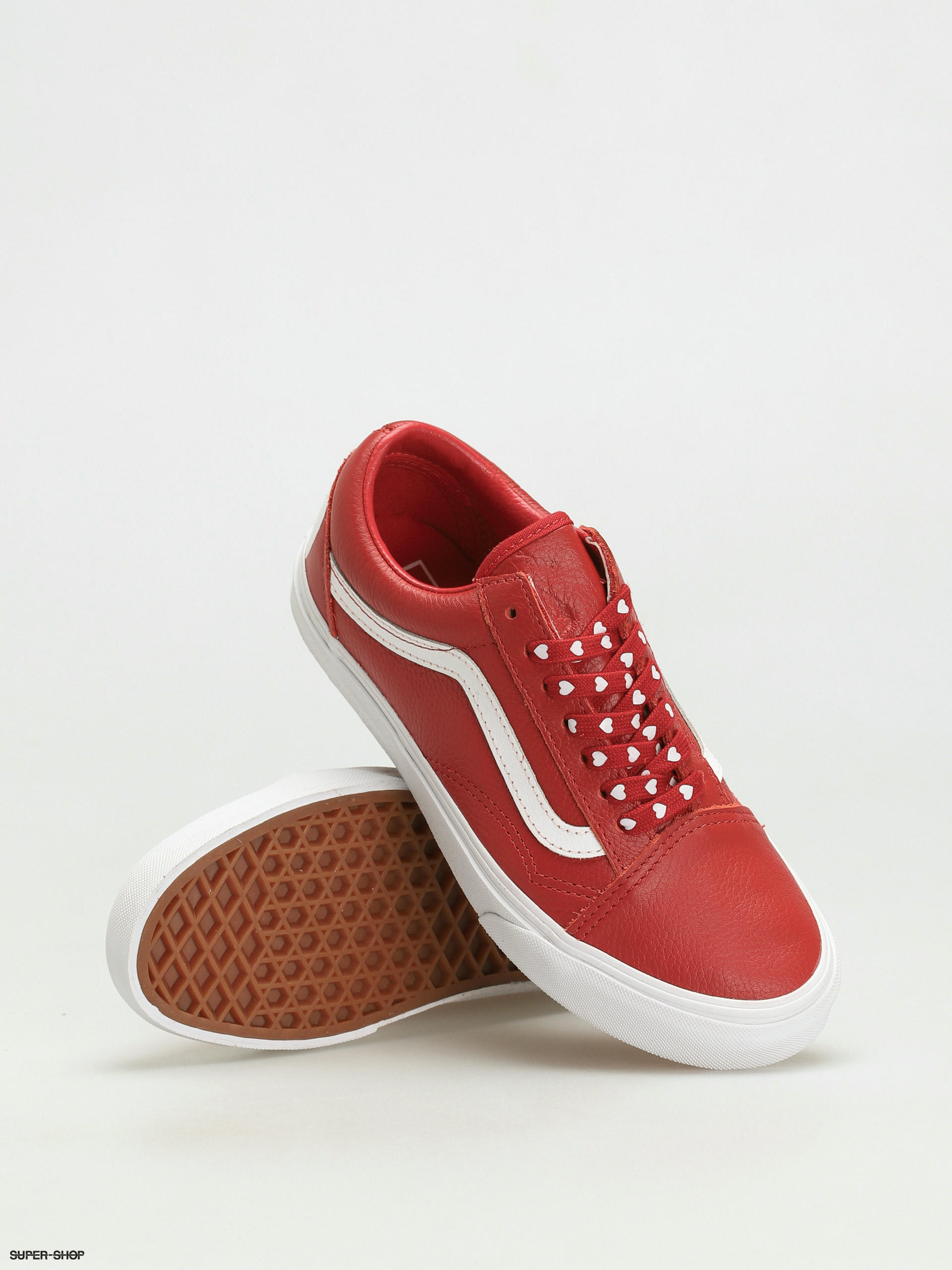 red and white vans with words