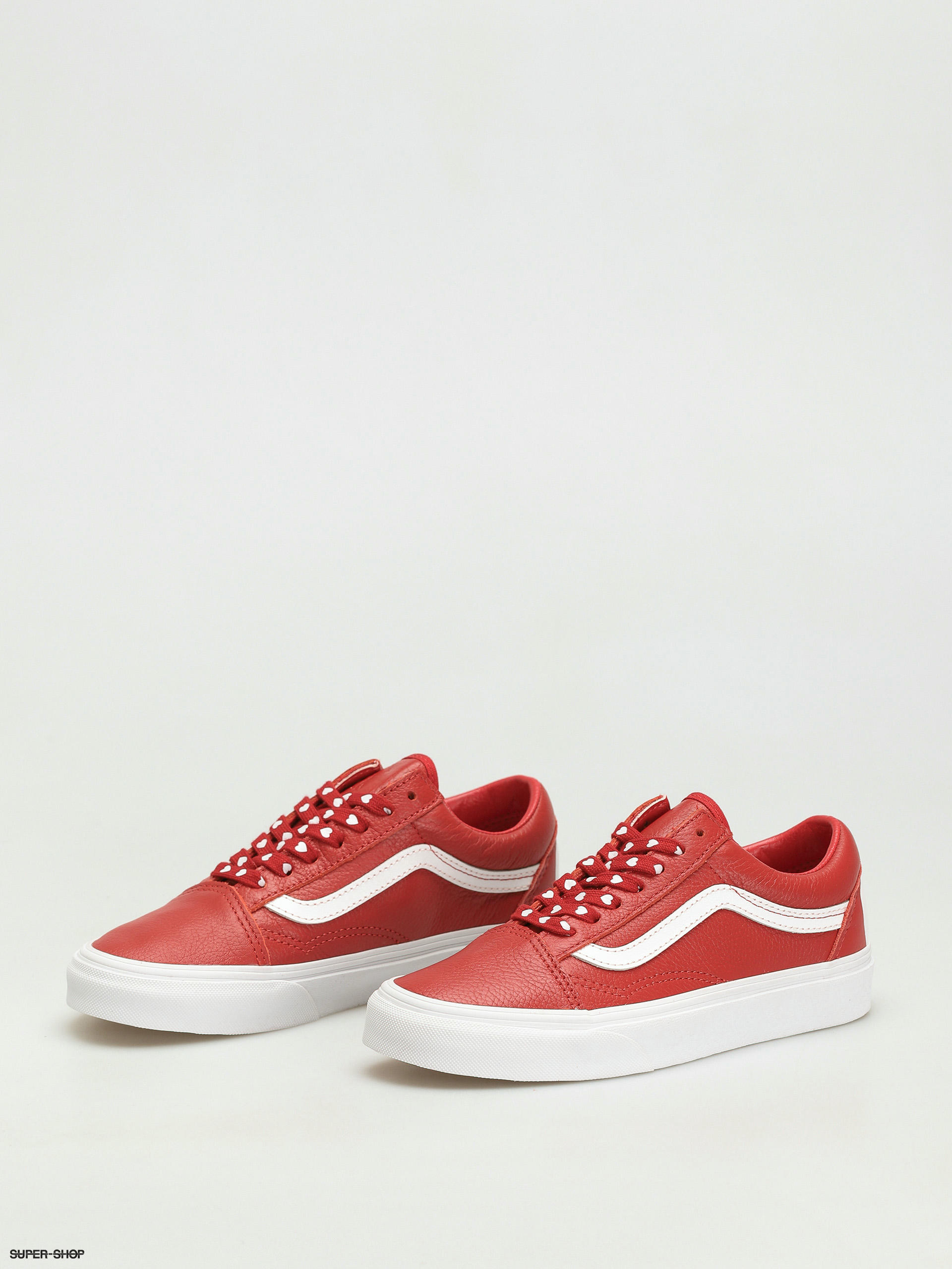 red and white vans with words