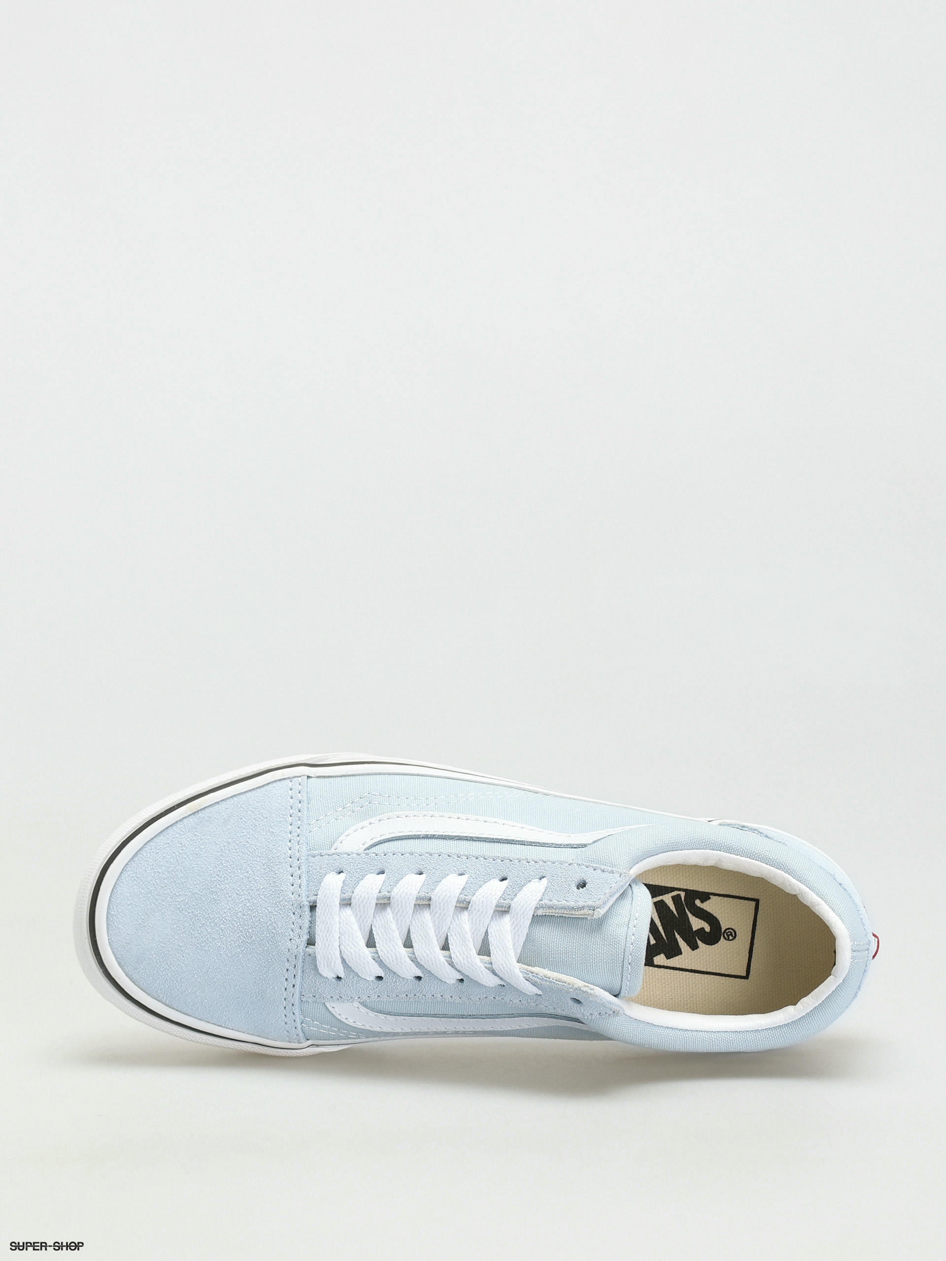 white and teal vans