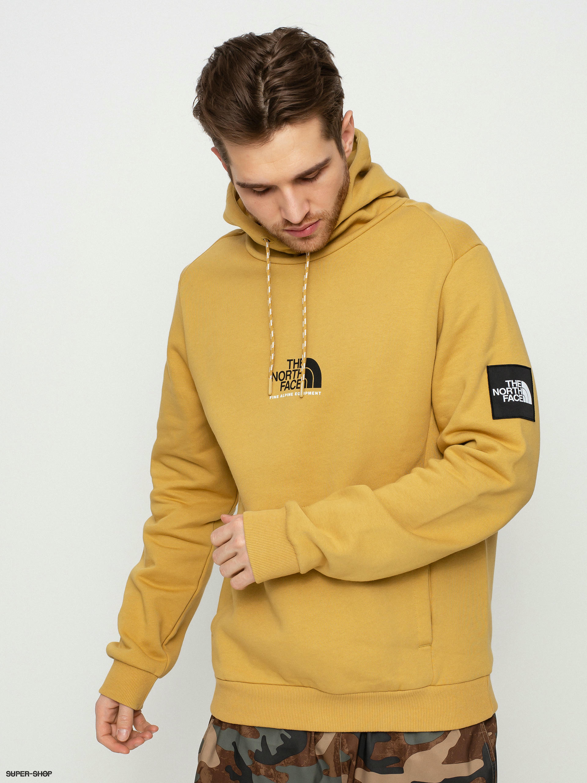 The north store face tan hoodie