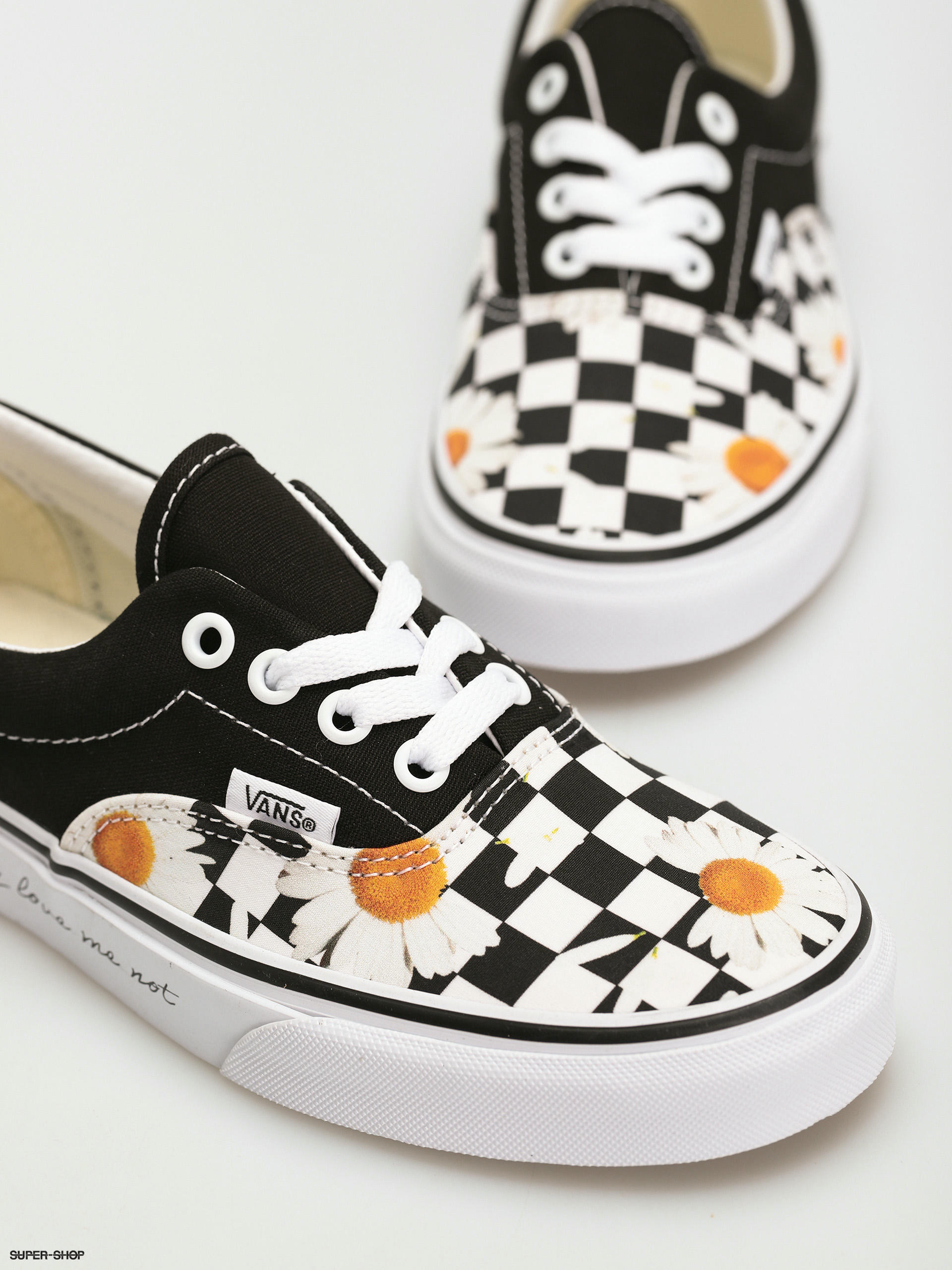 checkered vans with daisies