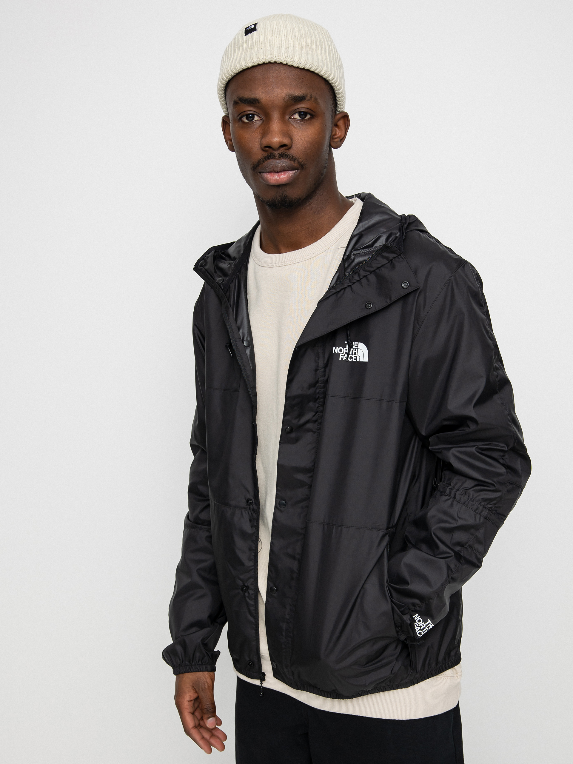 Black north face windbreaker mens online