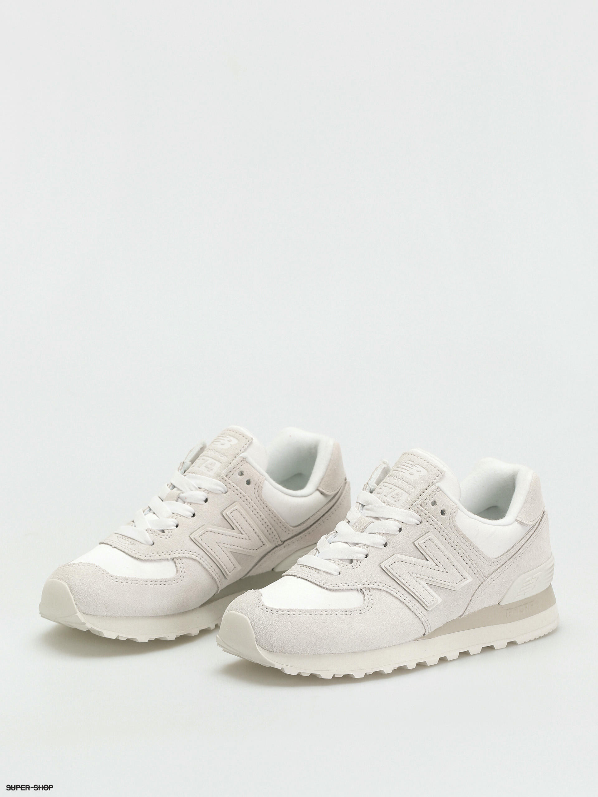 new balance 574 mid trainers in stone