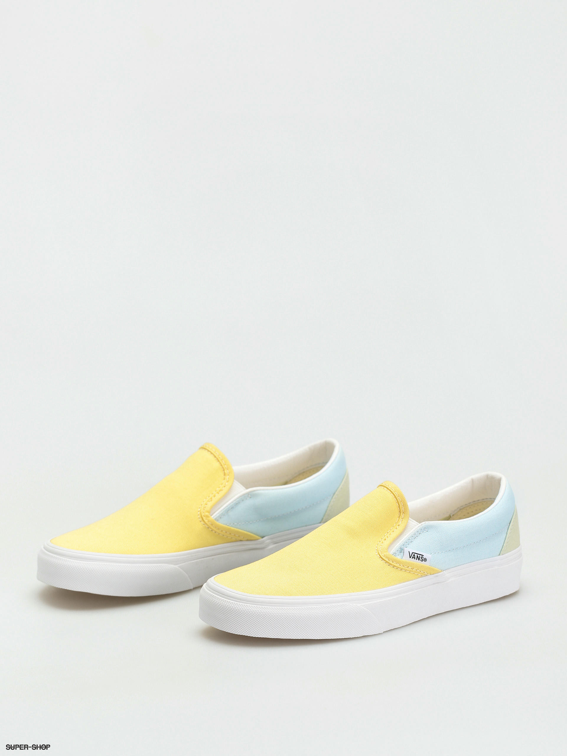 Pastel yellow vans sales slip on