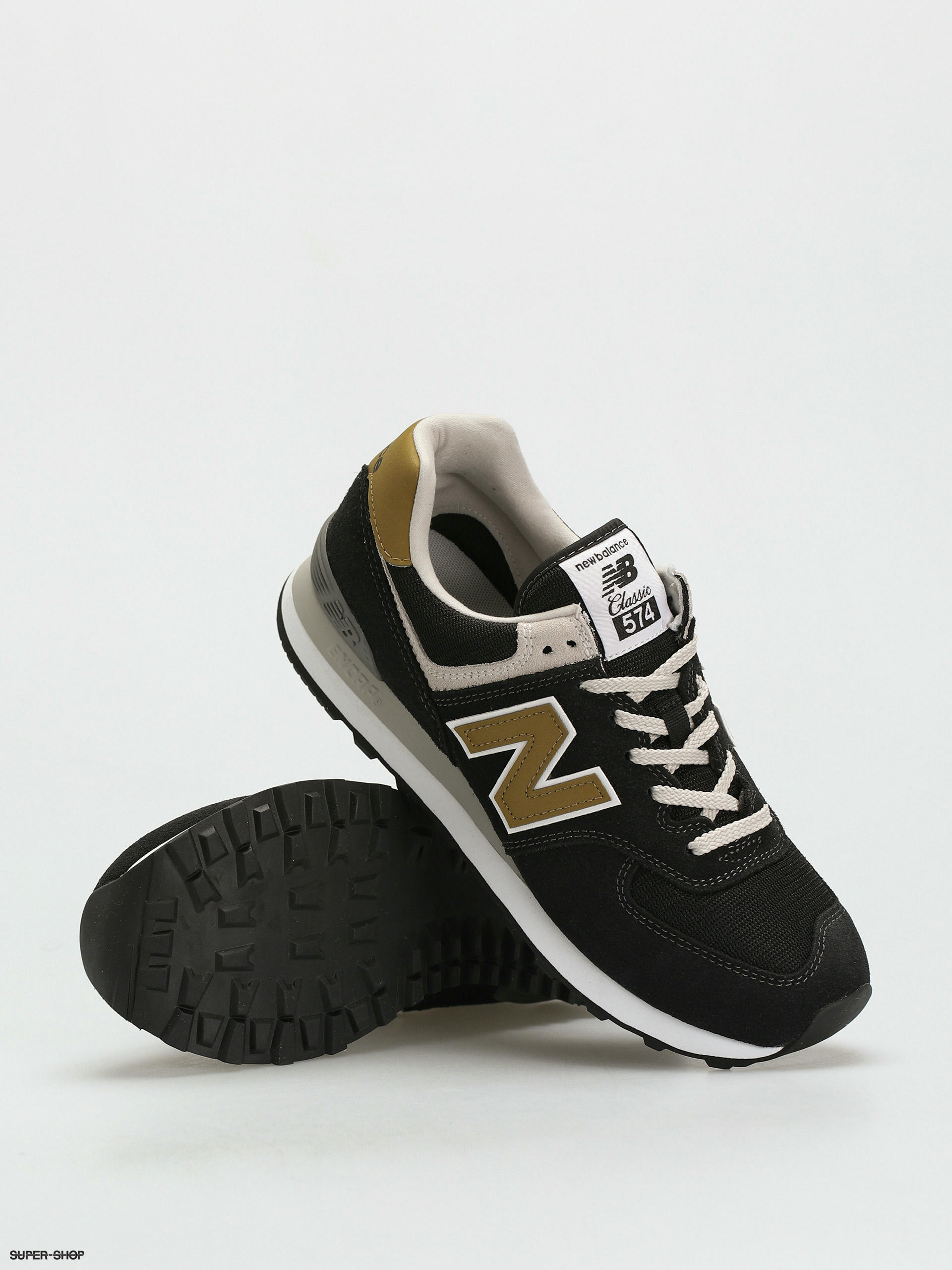 574 new balance black and gold