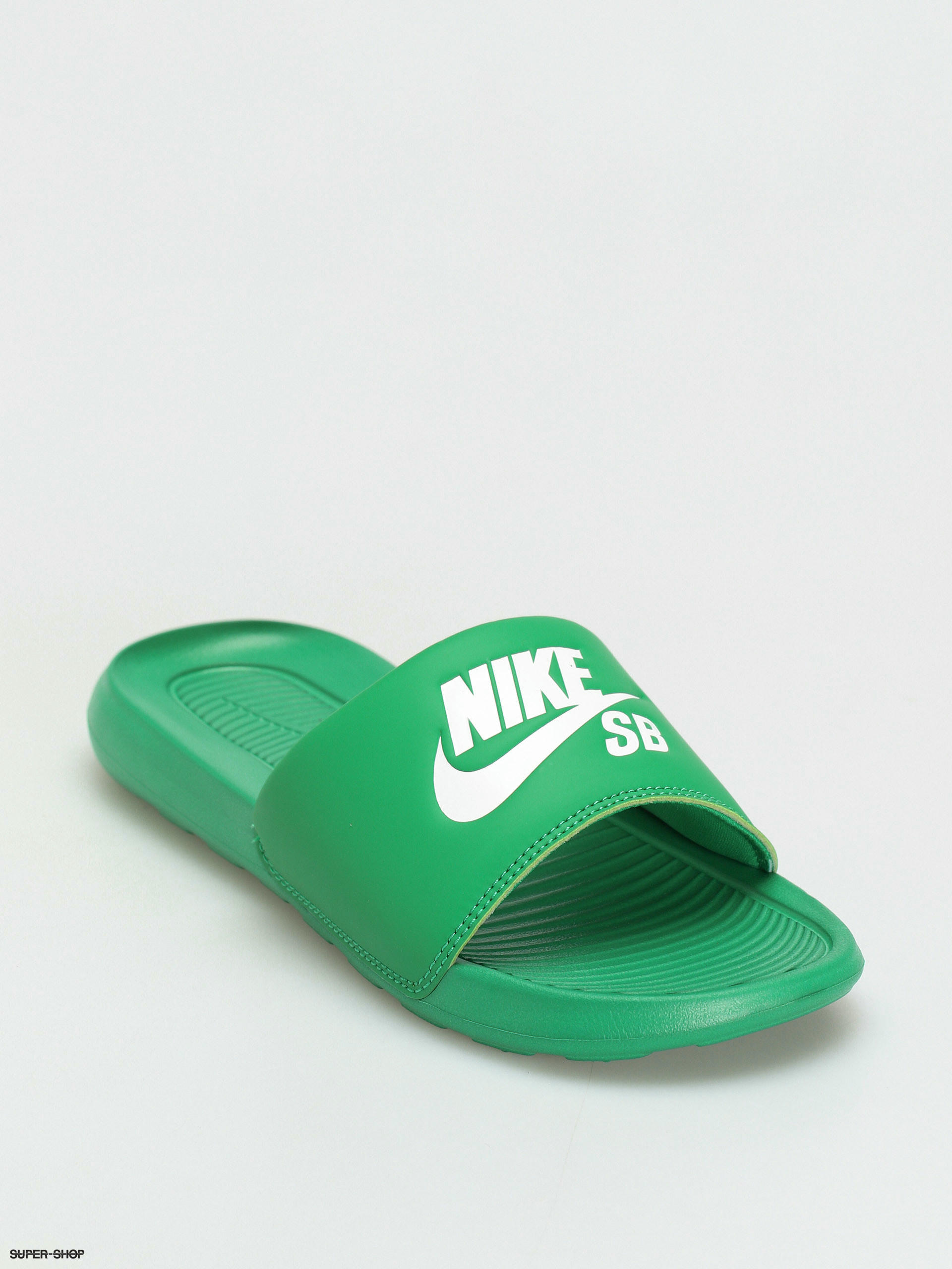 mint green nike flip flops