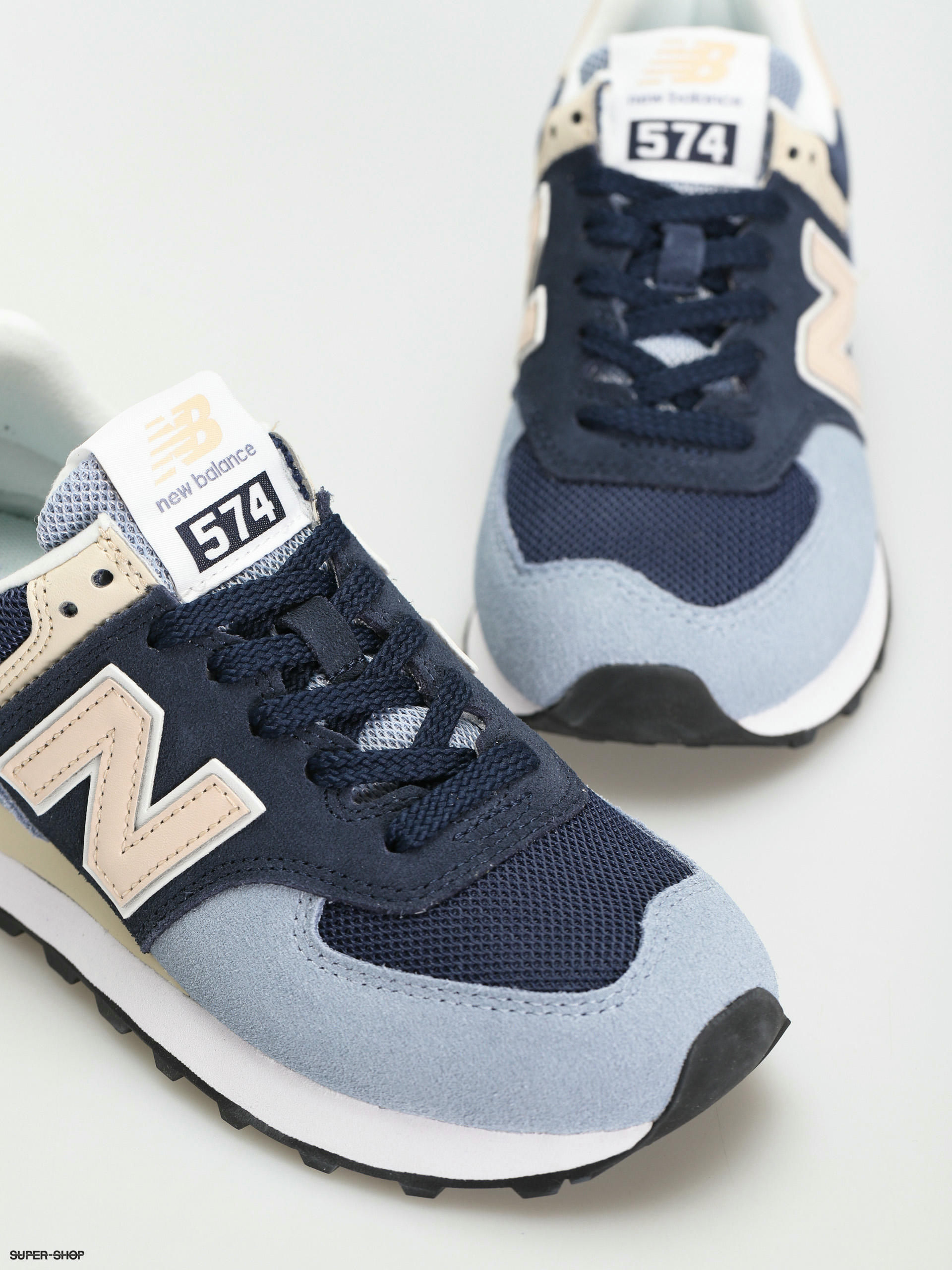 new balance blue 574 sneakers