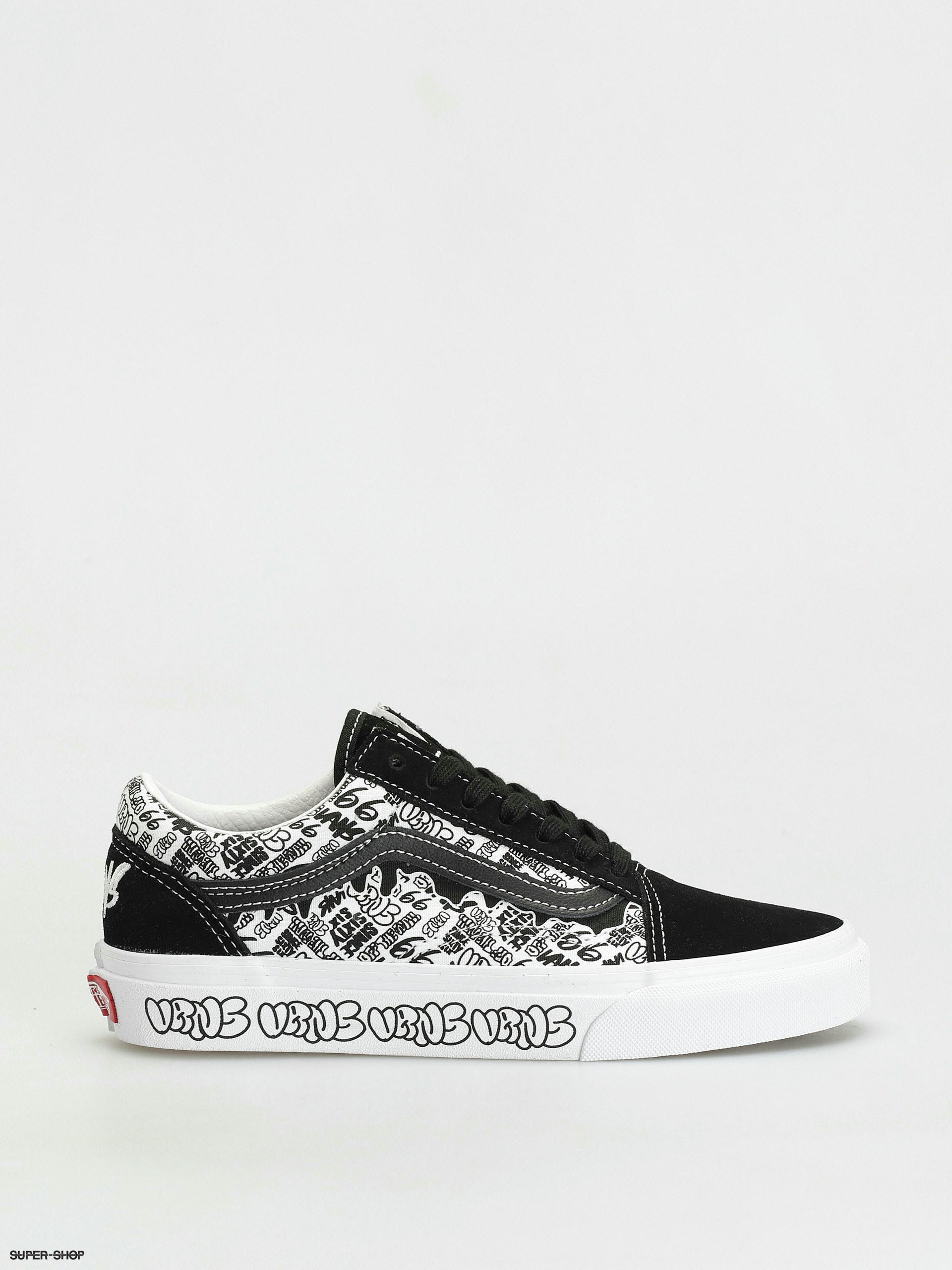 black and white vans with writing on them