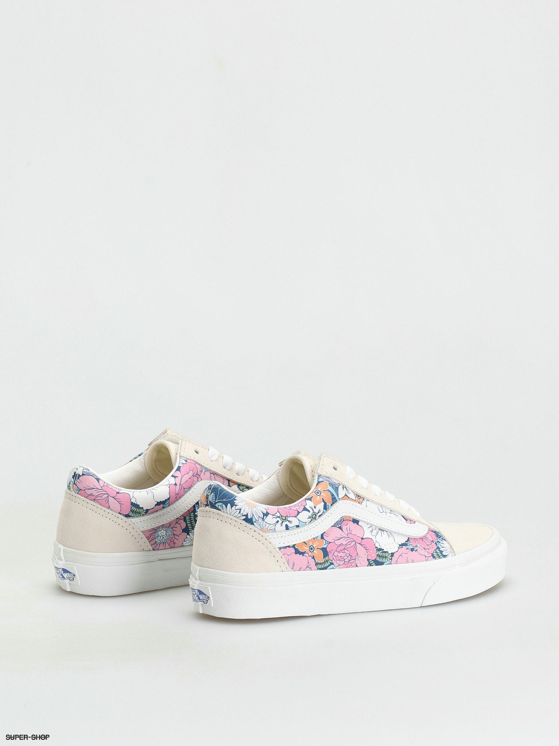 tan vans with flowers