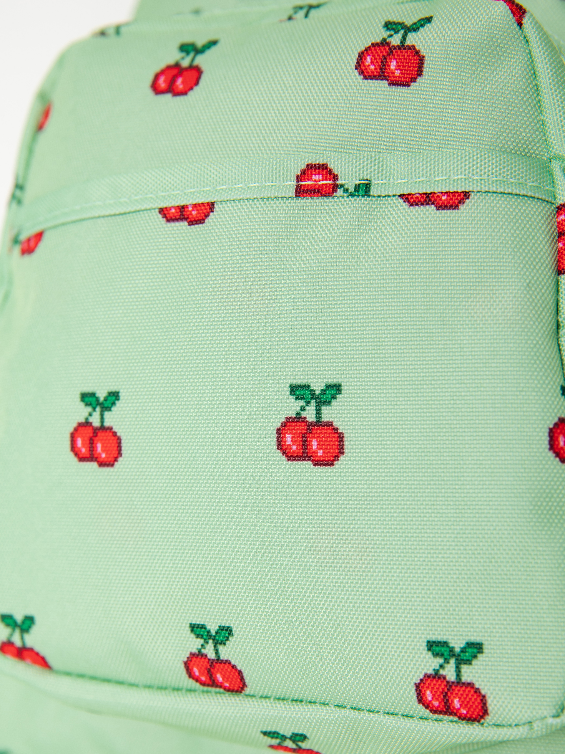 JanSport Half Pint Backpack (8 bit cherries)