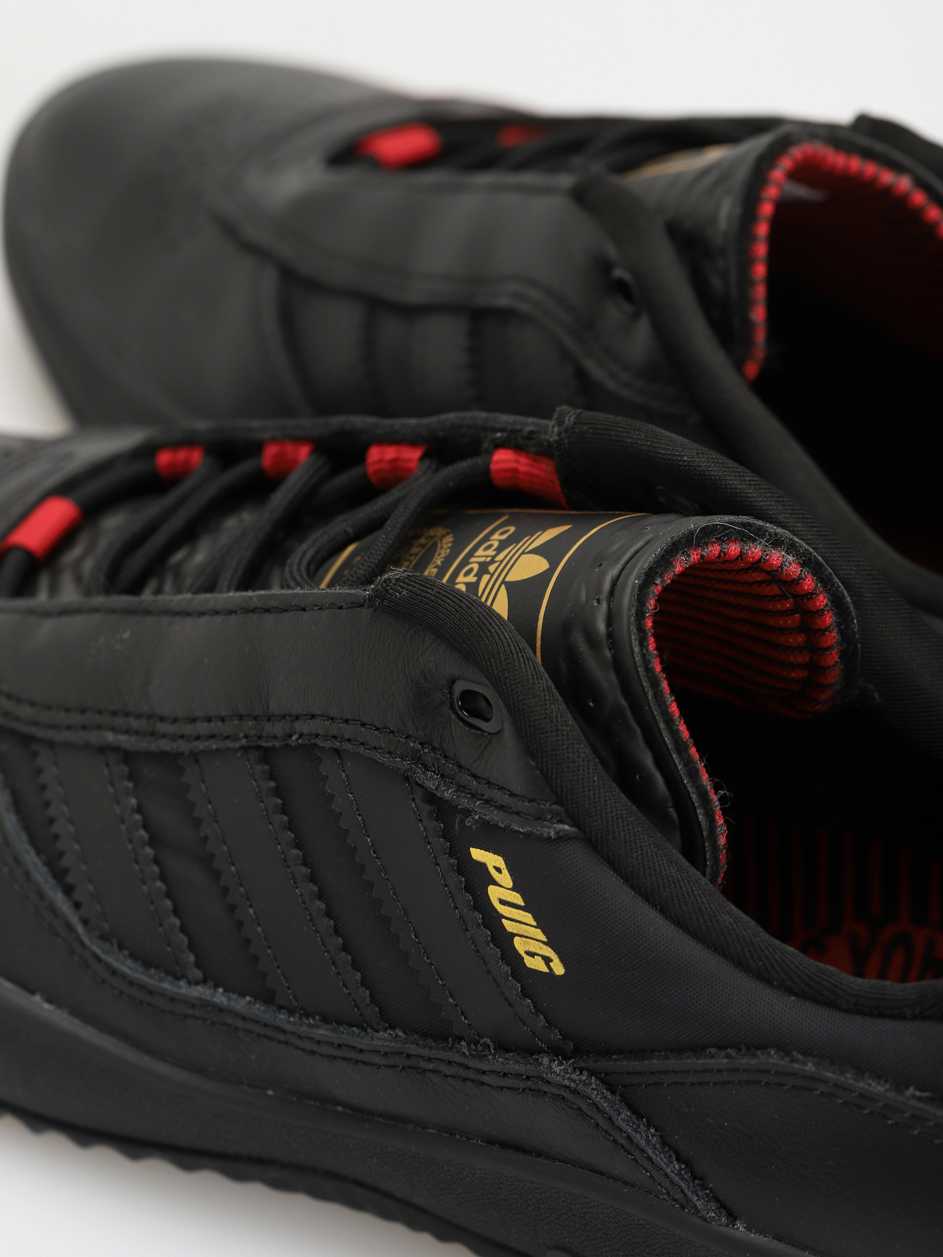 adidas Puig Shoes (cblack/cblack/scarle)