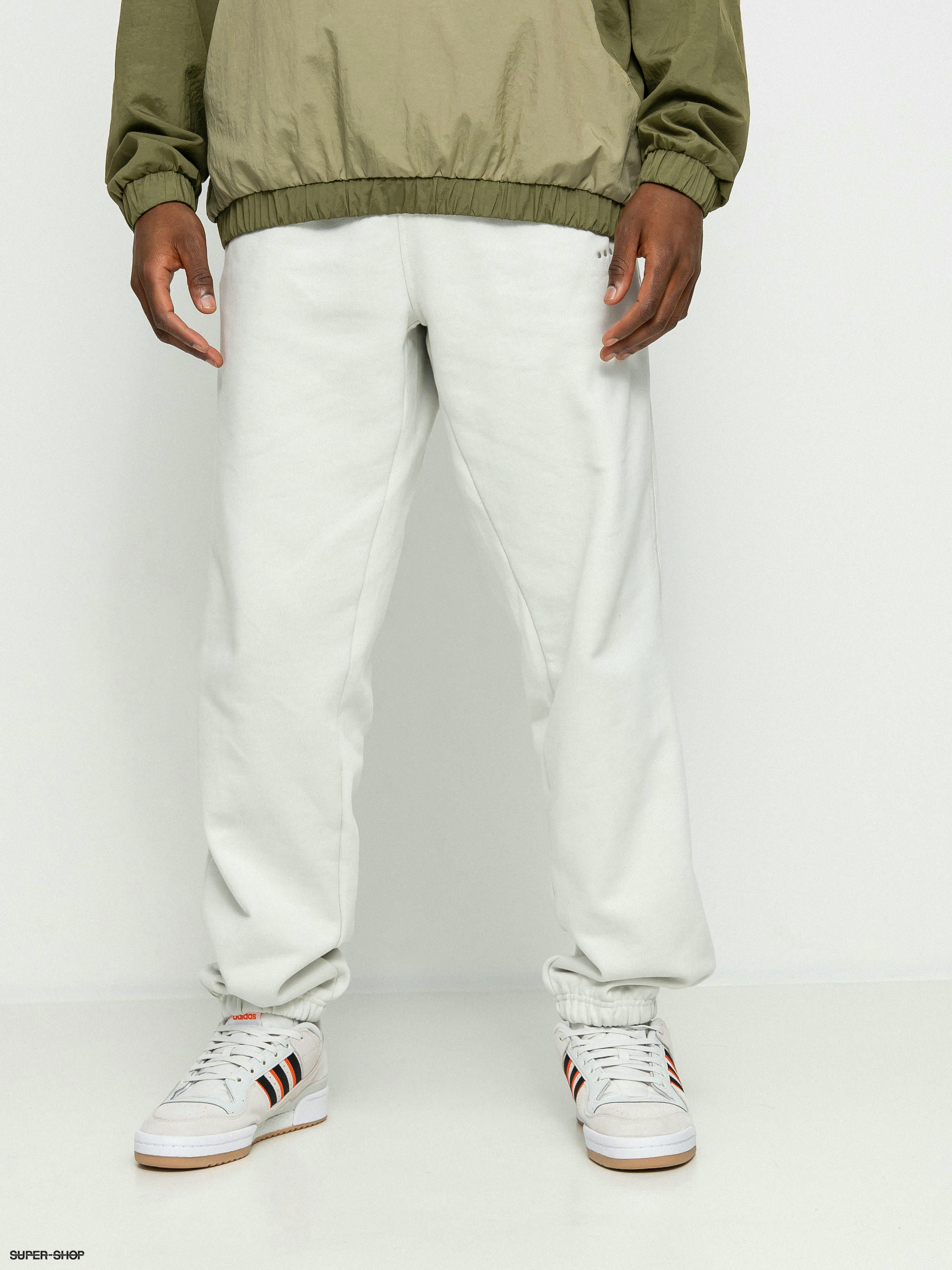 White lacoste guppy pants hot sale