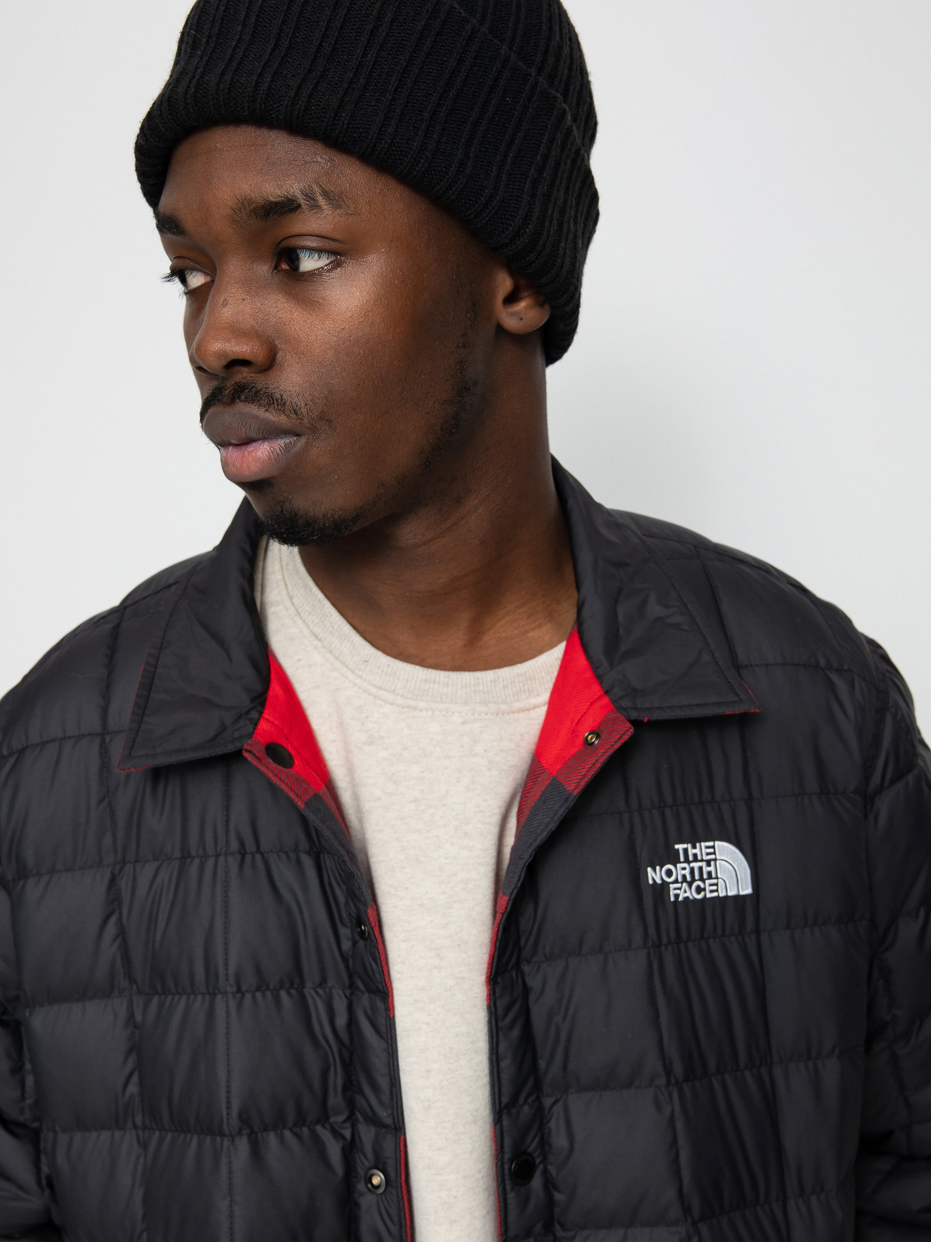 The North Face Reversible ThermoBall Jacke (tnf black/tnf red)