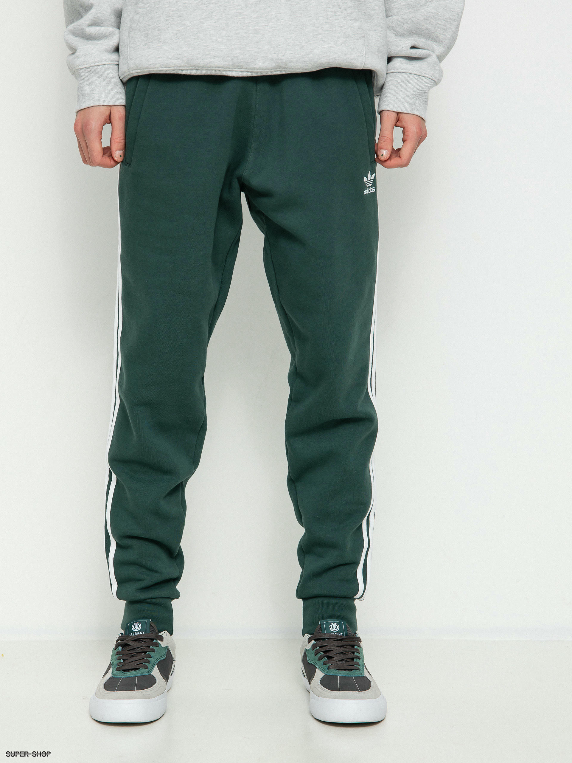 Army green adidas pants best sale