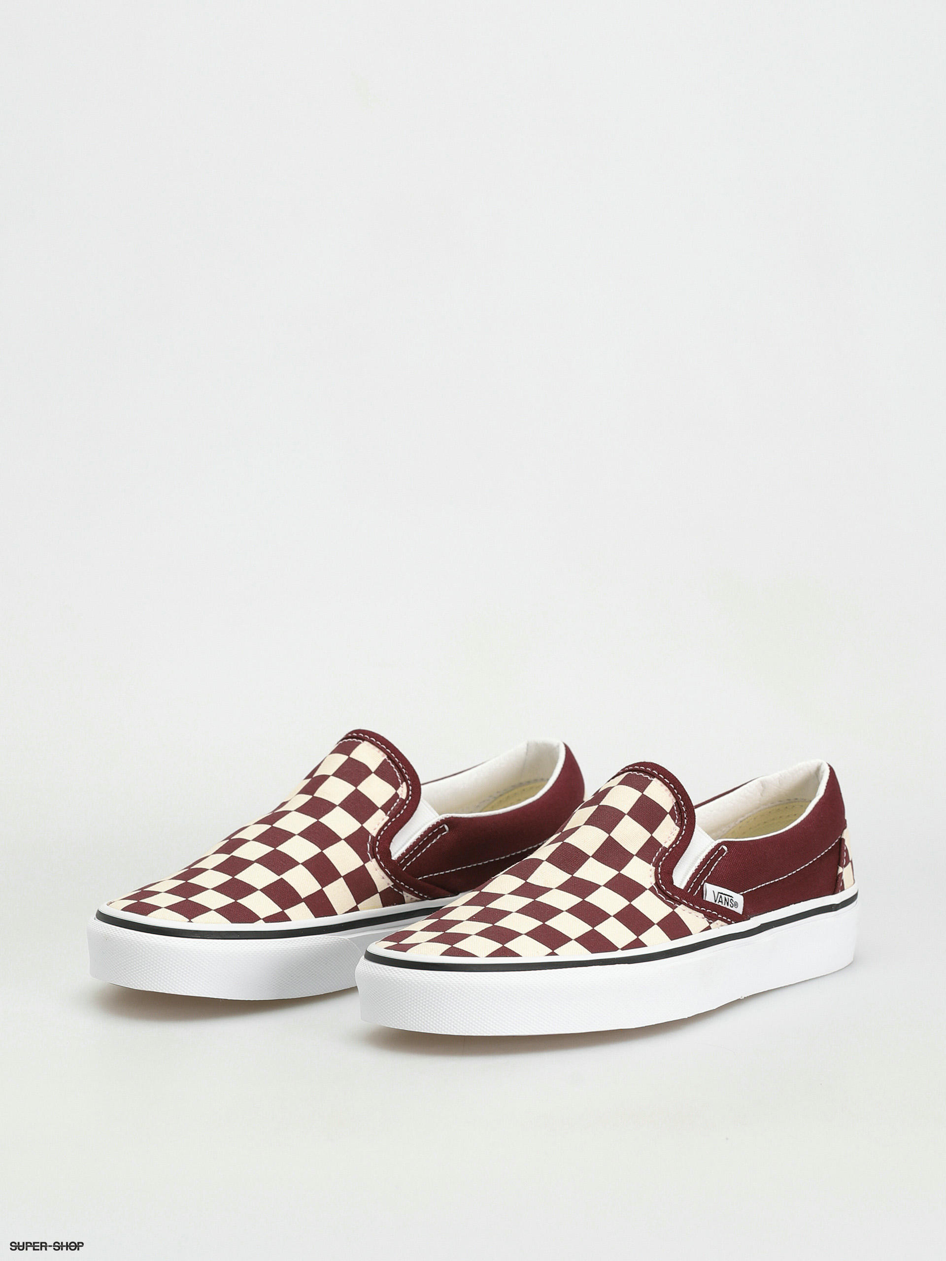 True white checkered store slip on vans