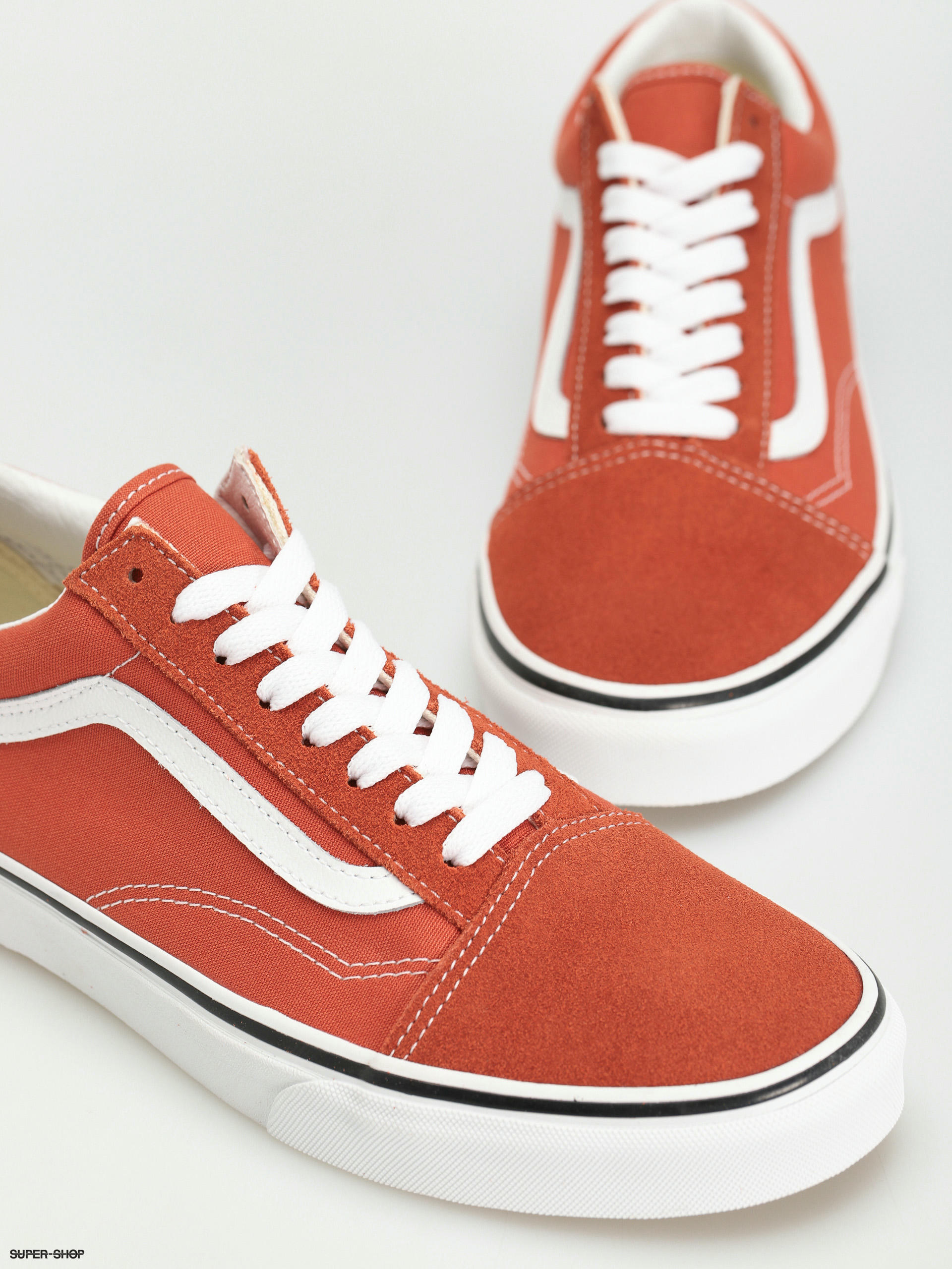 Ochre and clearance white vans