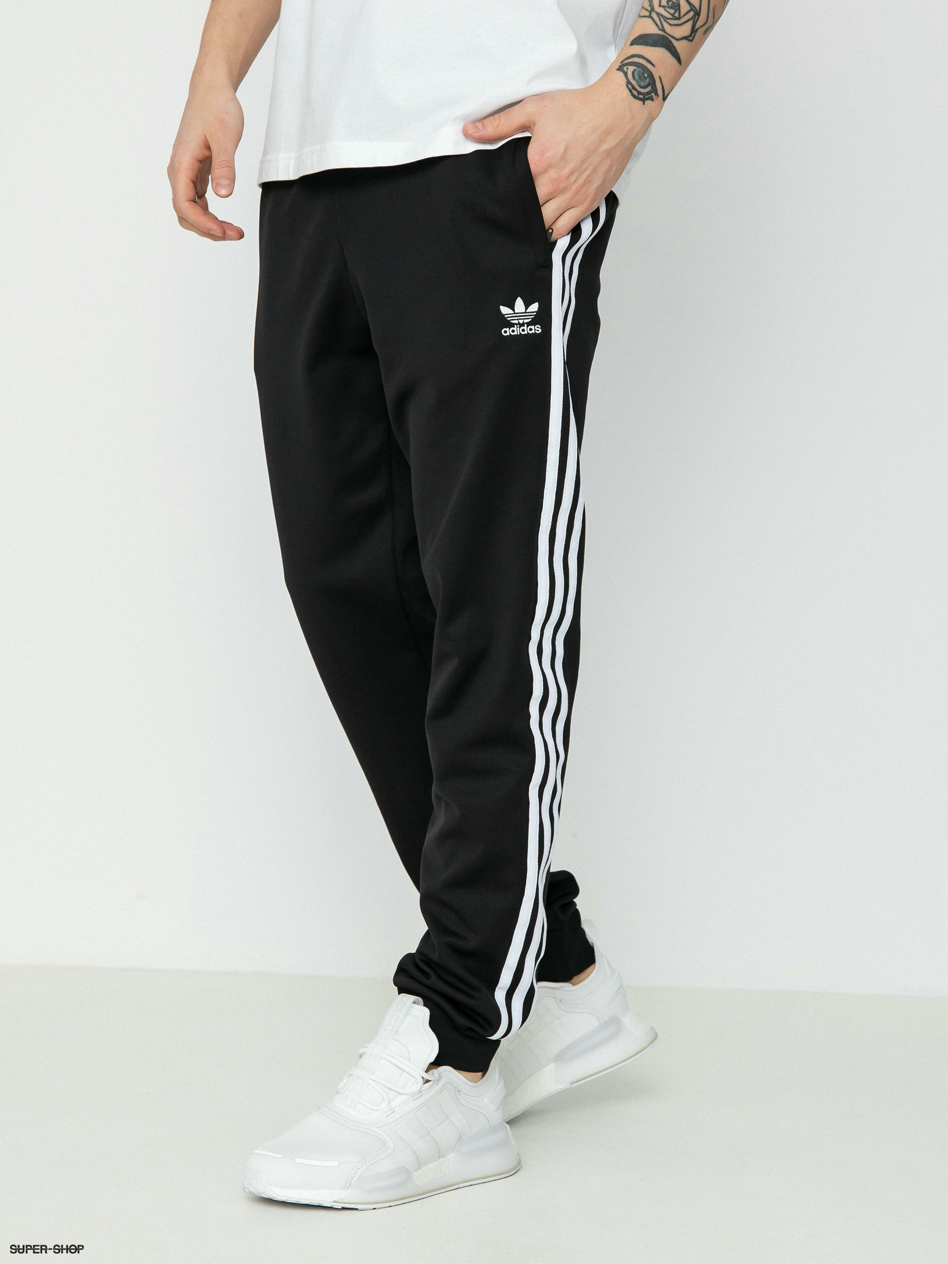 adidas Sportswear Essentials French Terry Tapered Cuff 3-stripes Joggers -  Clothing | Boozt.com