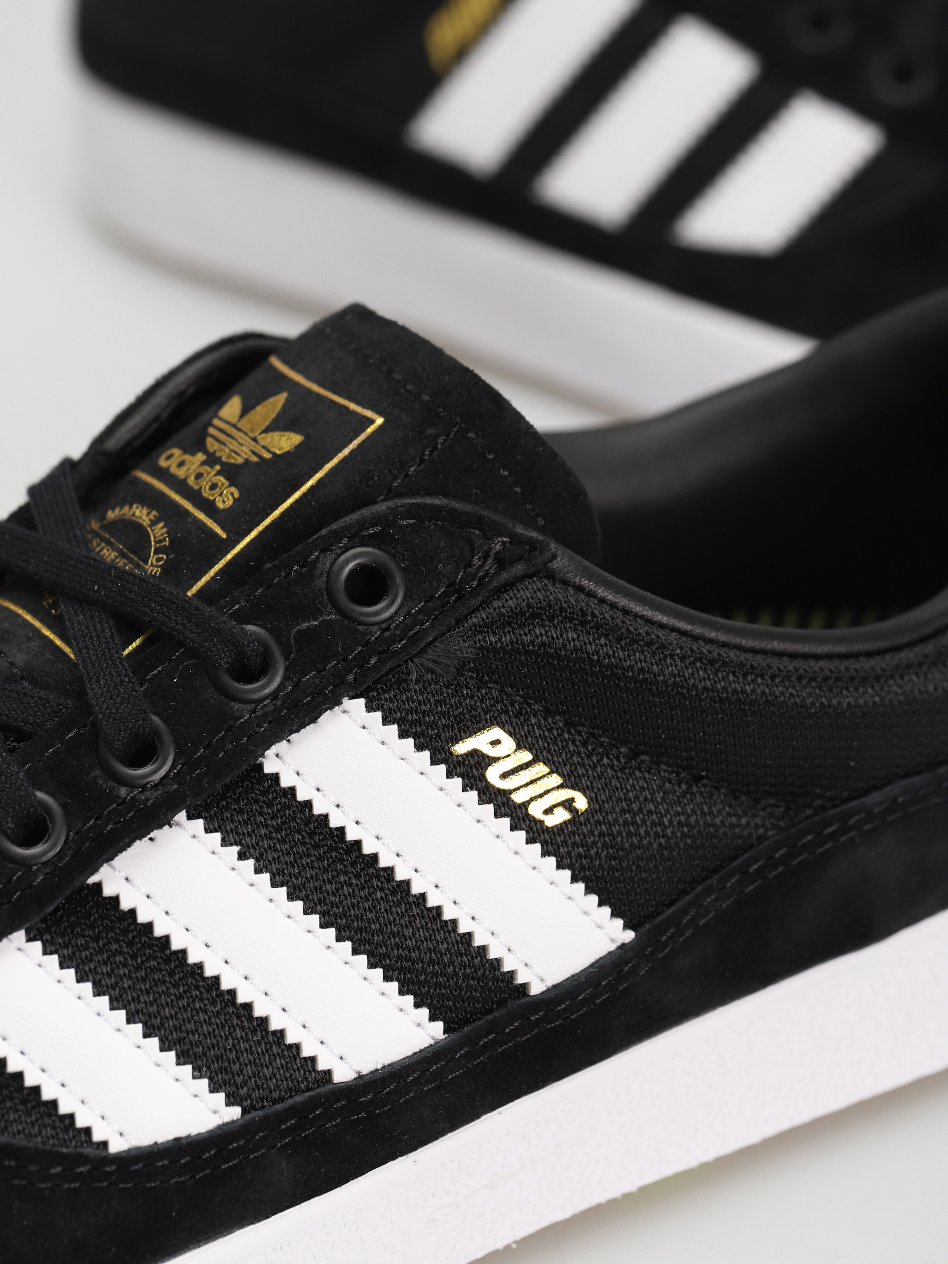 adidas Puig Indoor Schuhe (cblack/ftwwht/pullim)