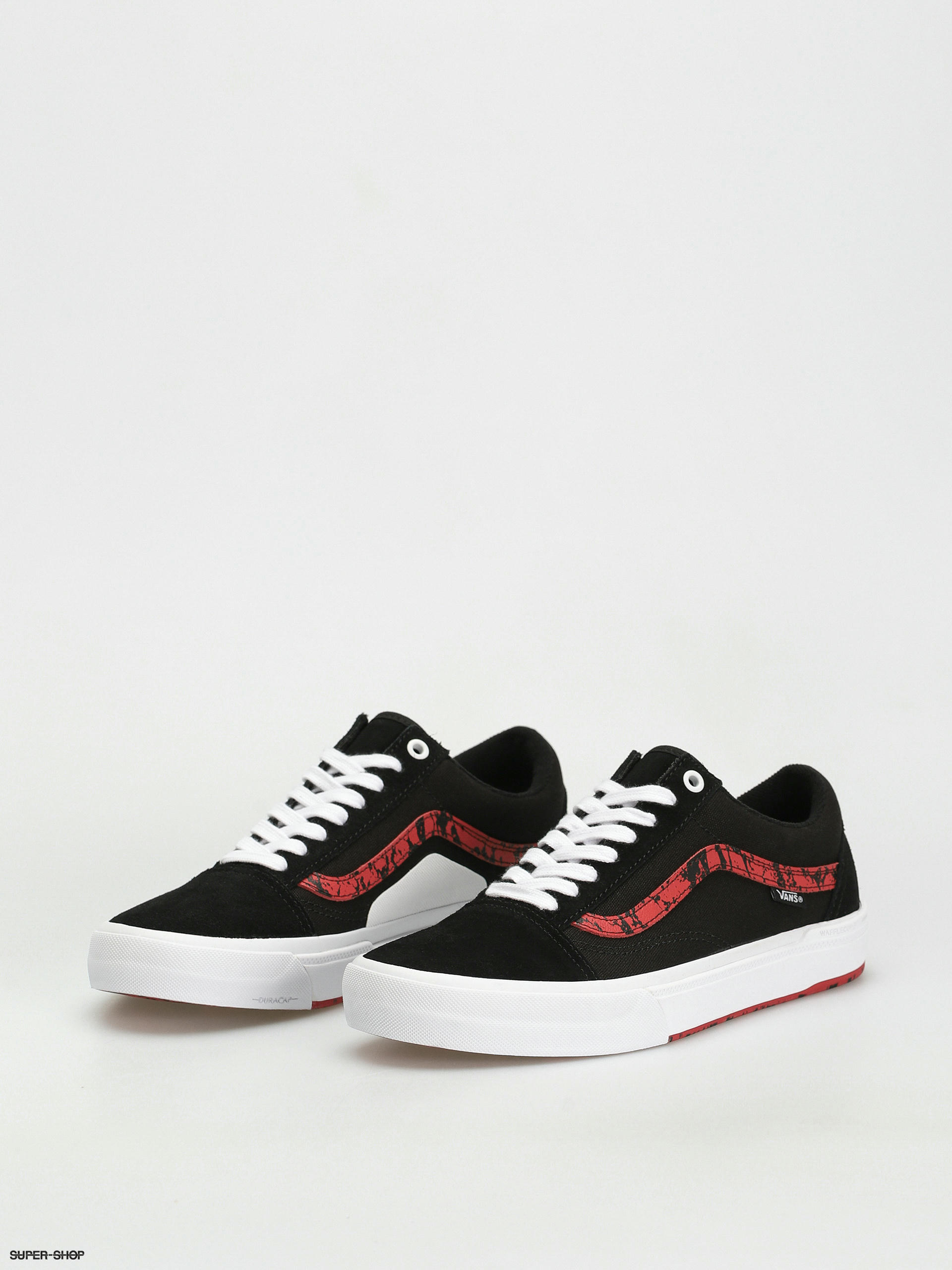 Vans black with red 2024 stripe