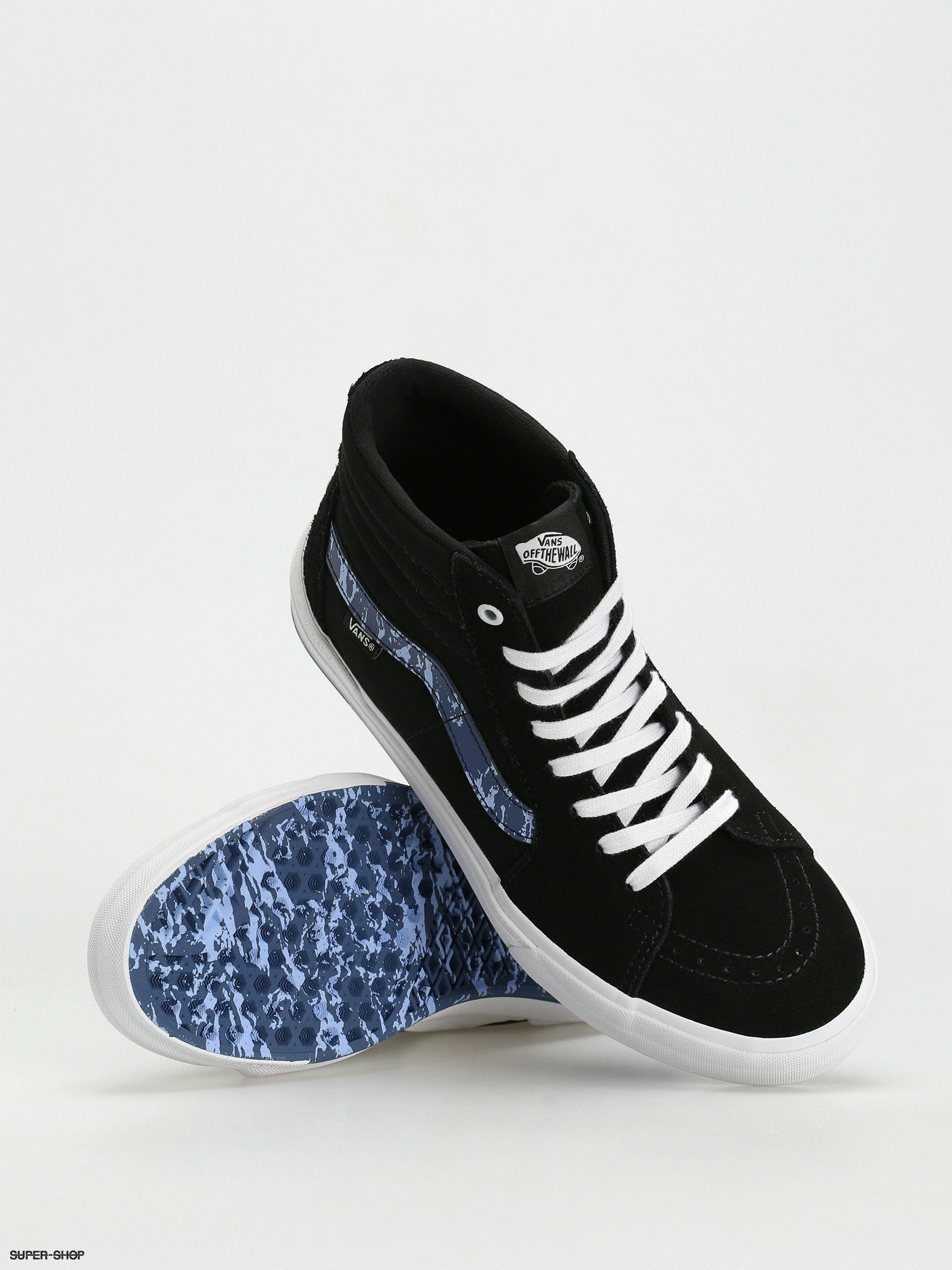 Black white store and blue vans