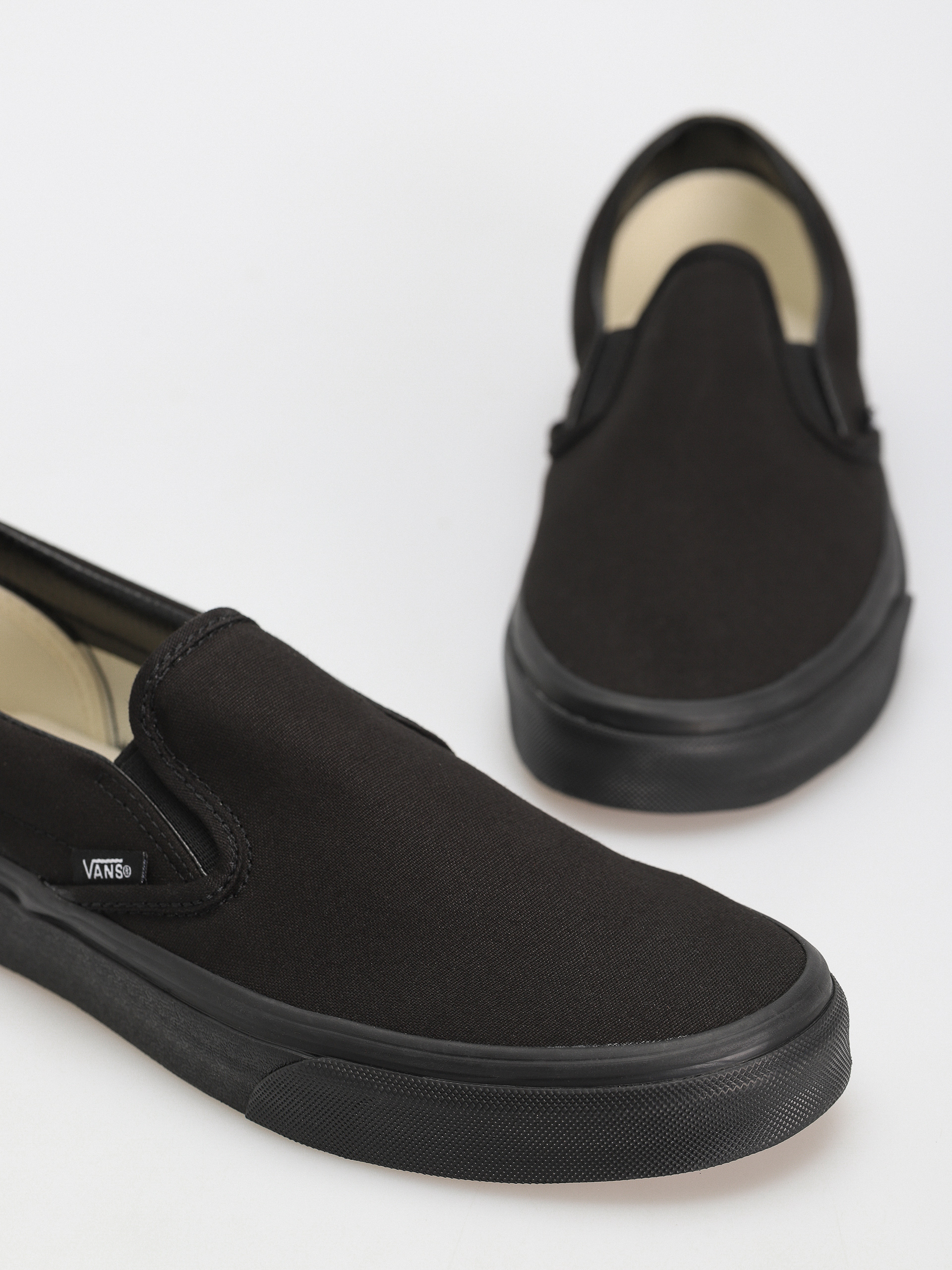 All black vans womens slip on on sale