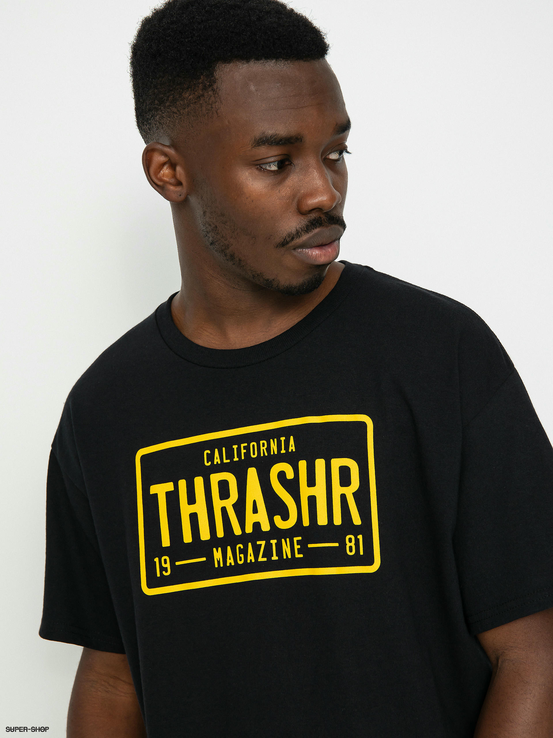 Yellow store thrasher shirt