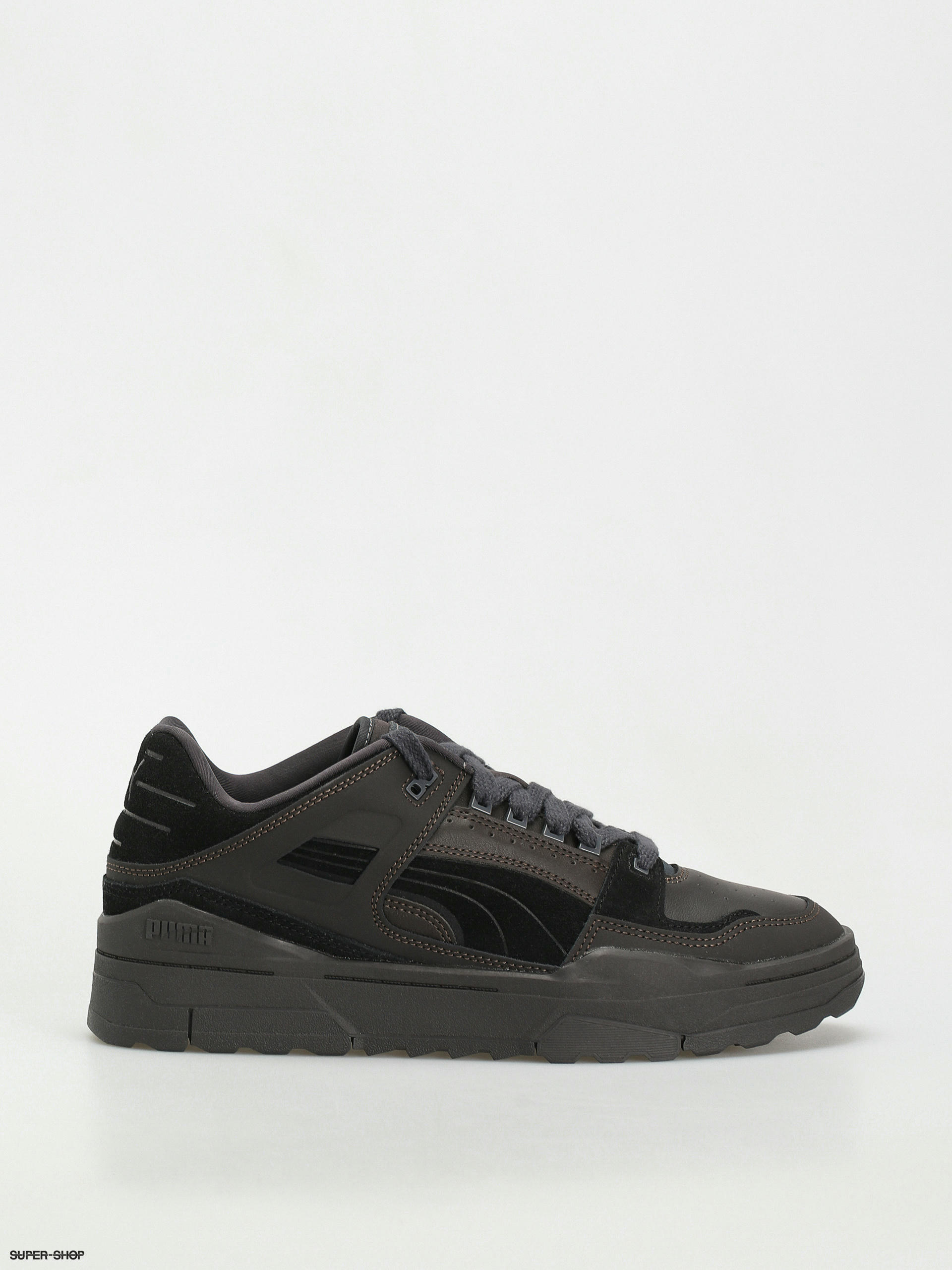 Puma black and on sale white leather shoes