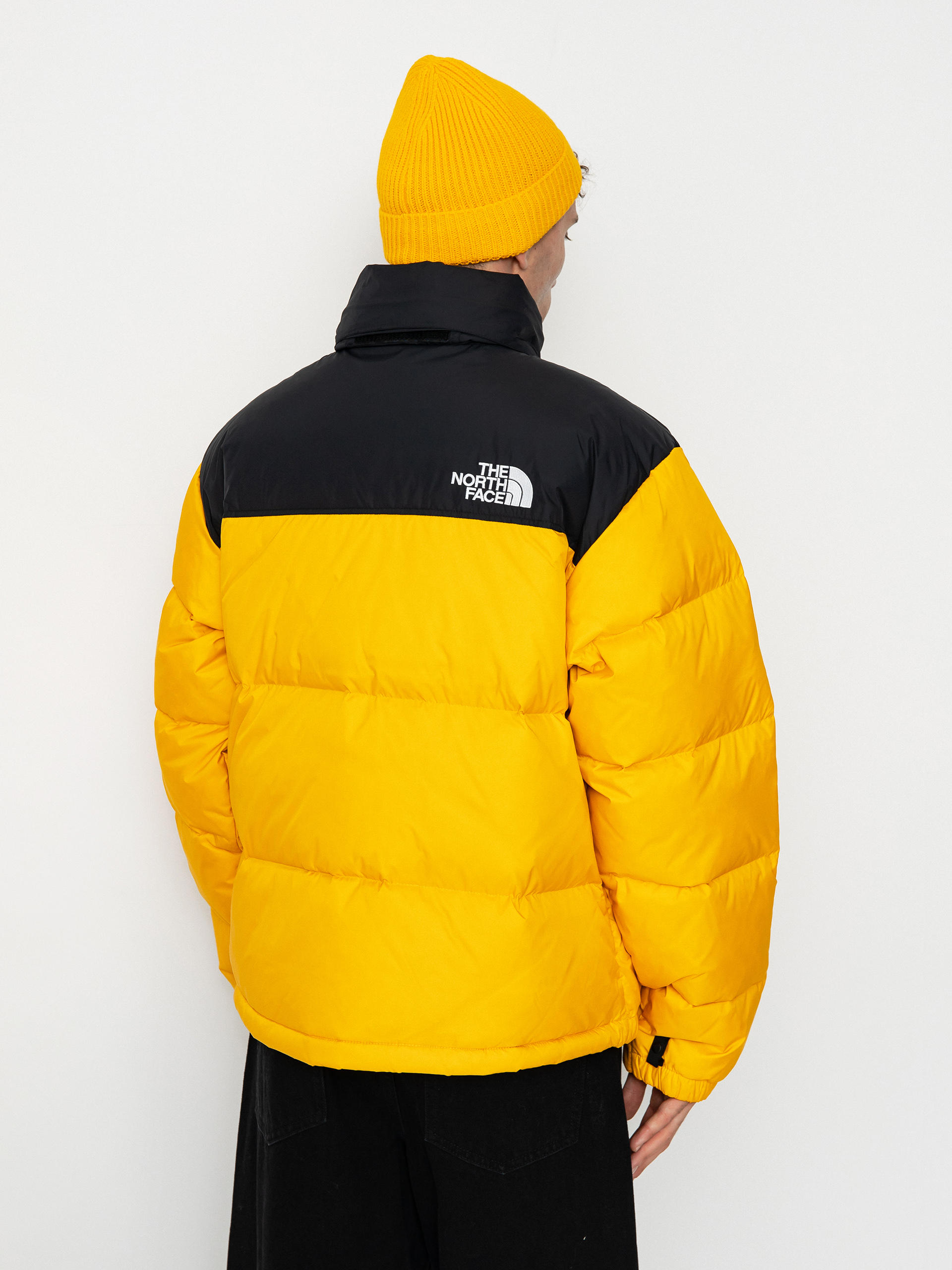 The North Face 1996 Retro Nuptse Jacke (summit gold/tnf black)