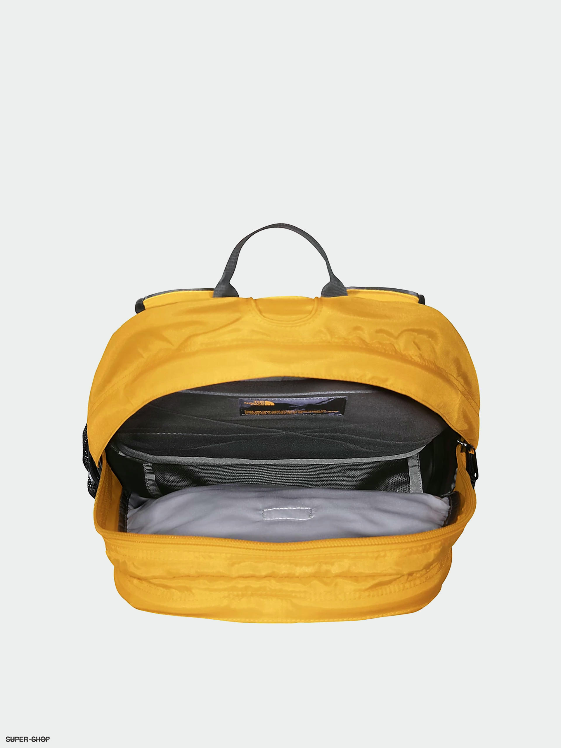 North face hotsell backpack gold zipper