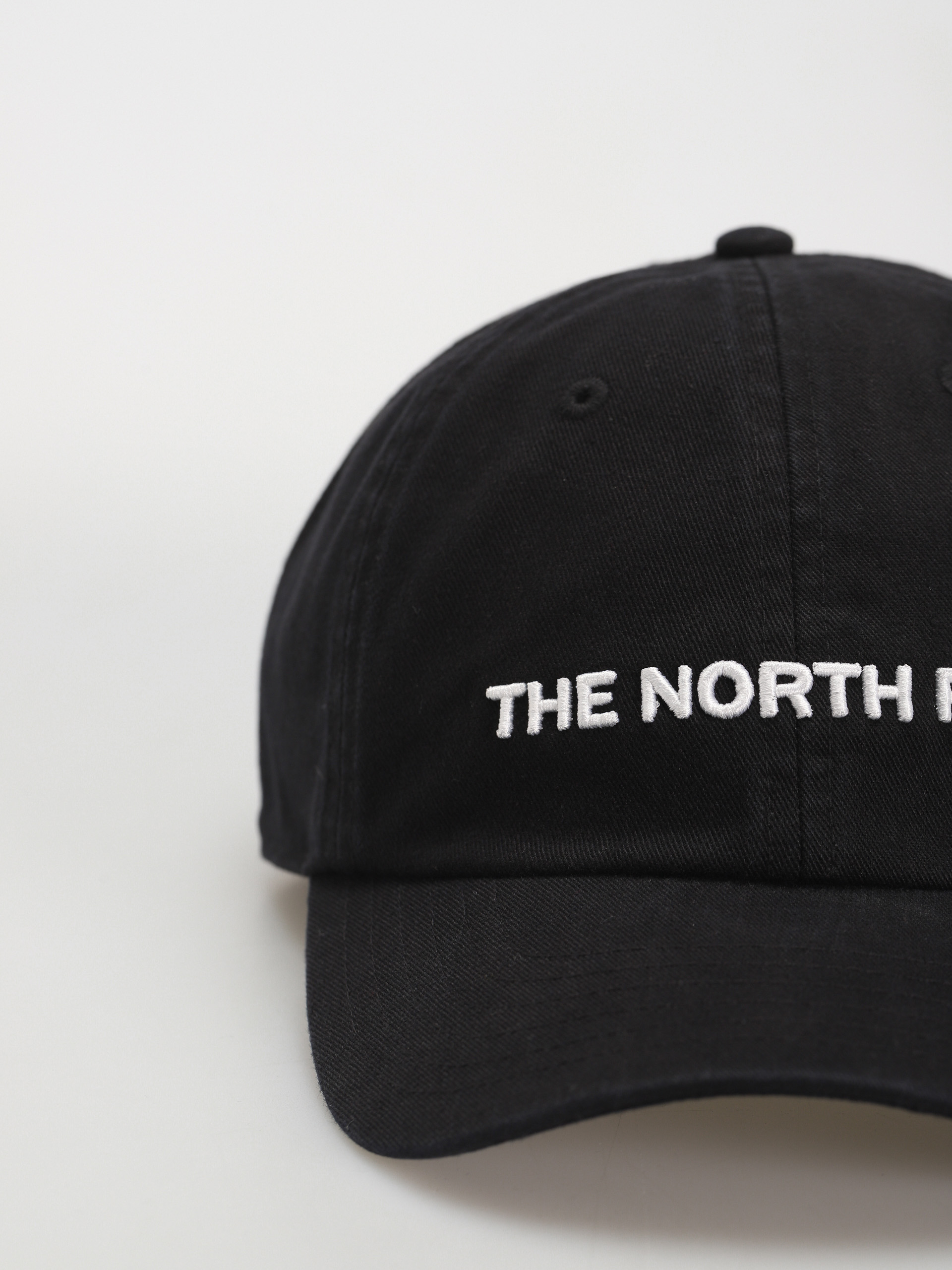 The North Face Roomy Norm Cap (tnf black/washed/horizo)