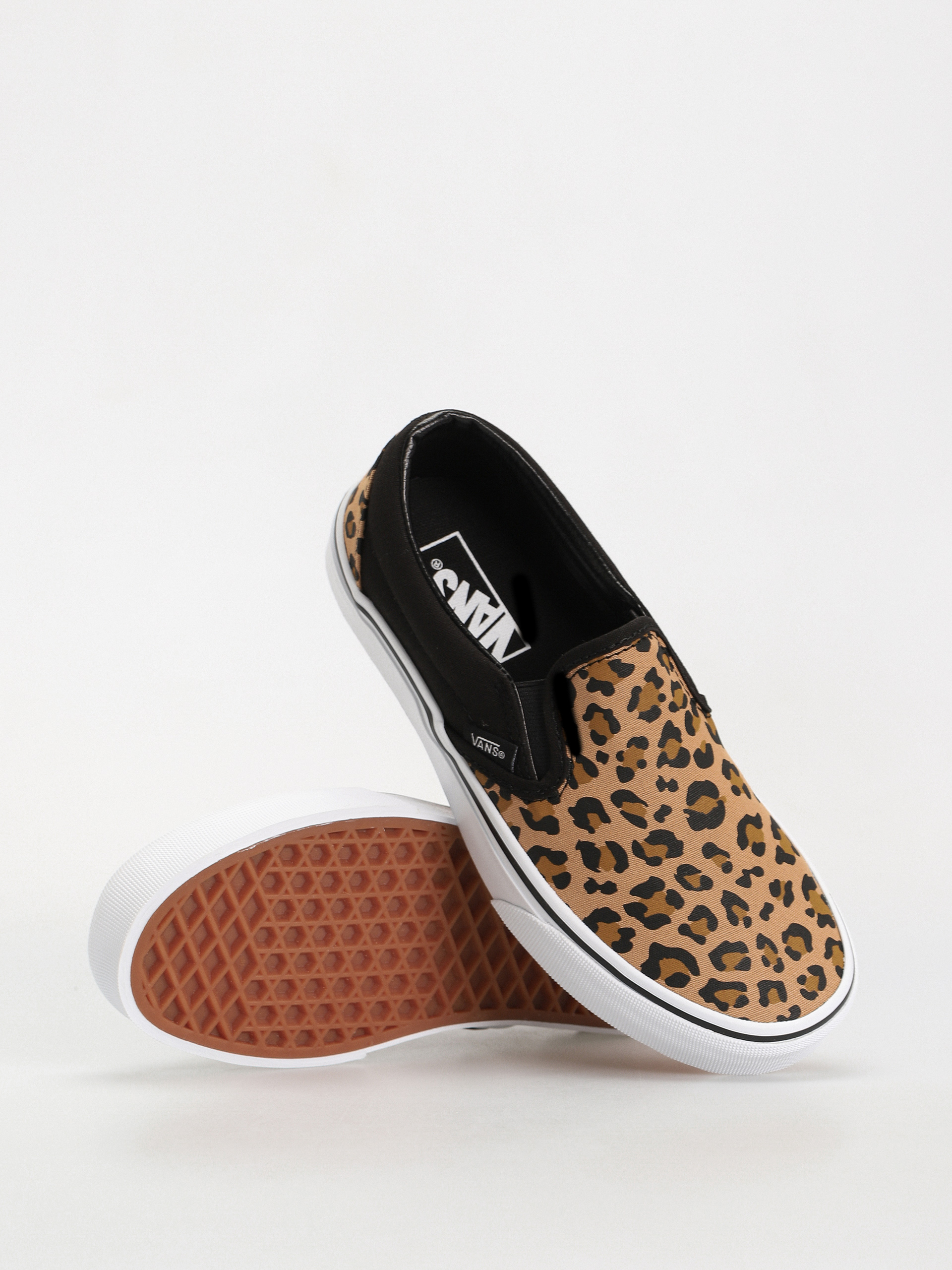 Black and brown slip on vans hotsell