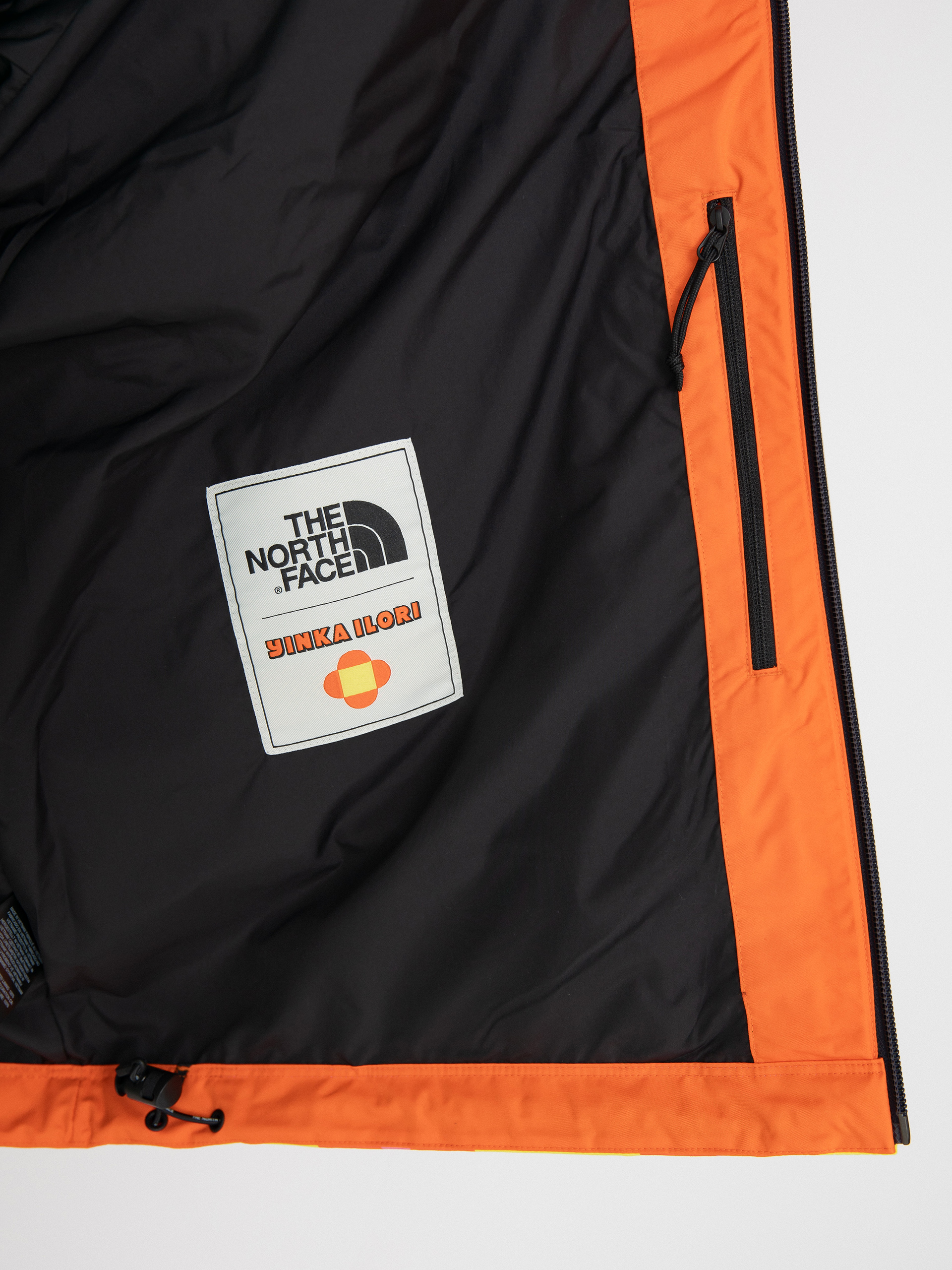 The North Face X Yinka Ilori 2L Rainshell Jacket (gamma pink lets blossom)