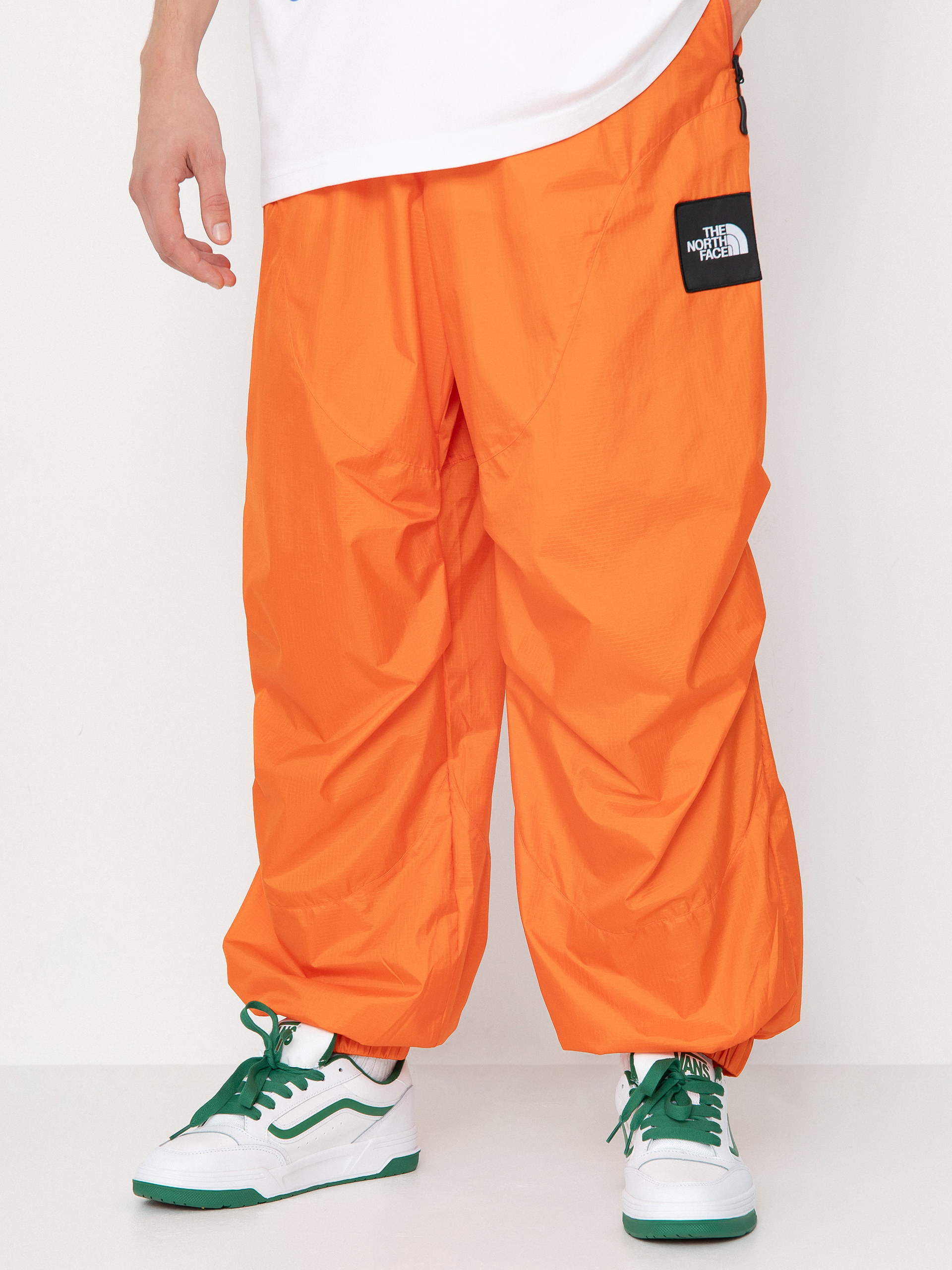 The North Face X Yinka Ilori Windshell Hose (red orange)