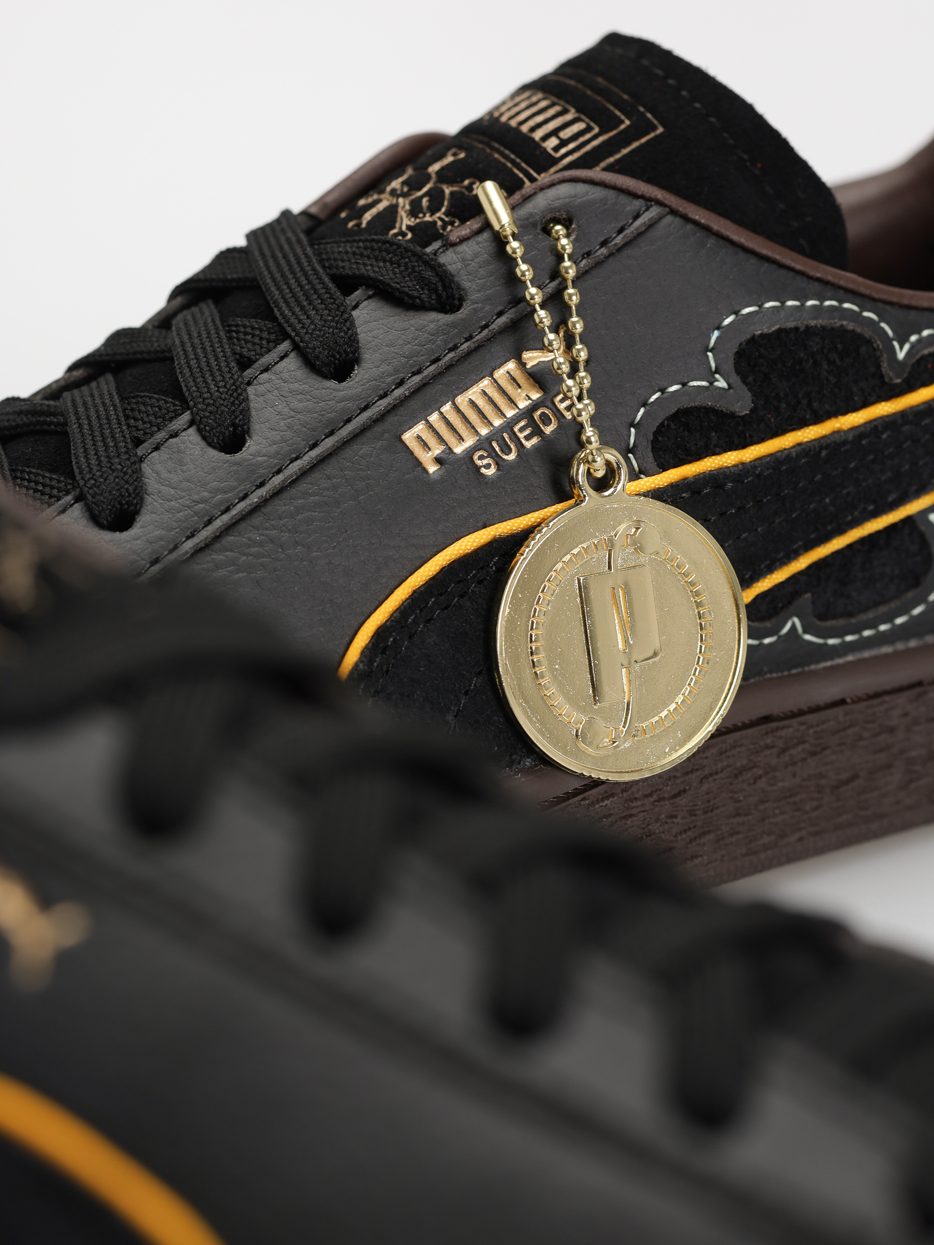 Black puma shoes with gold on sale