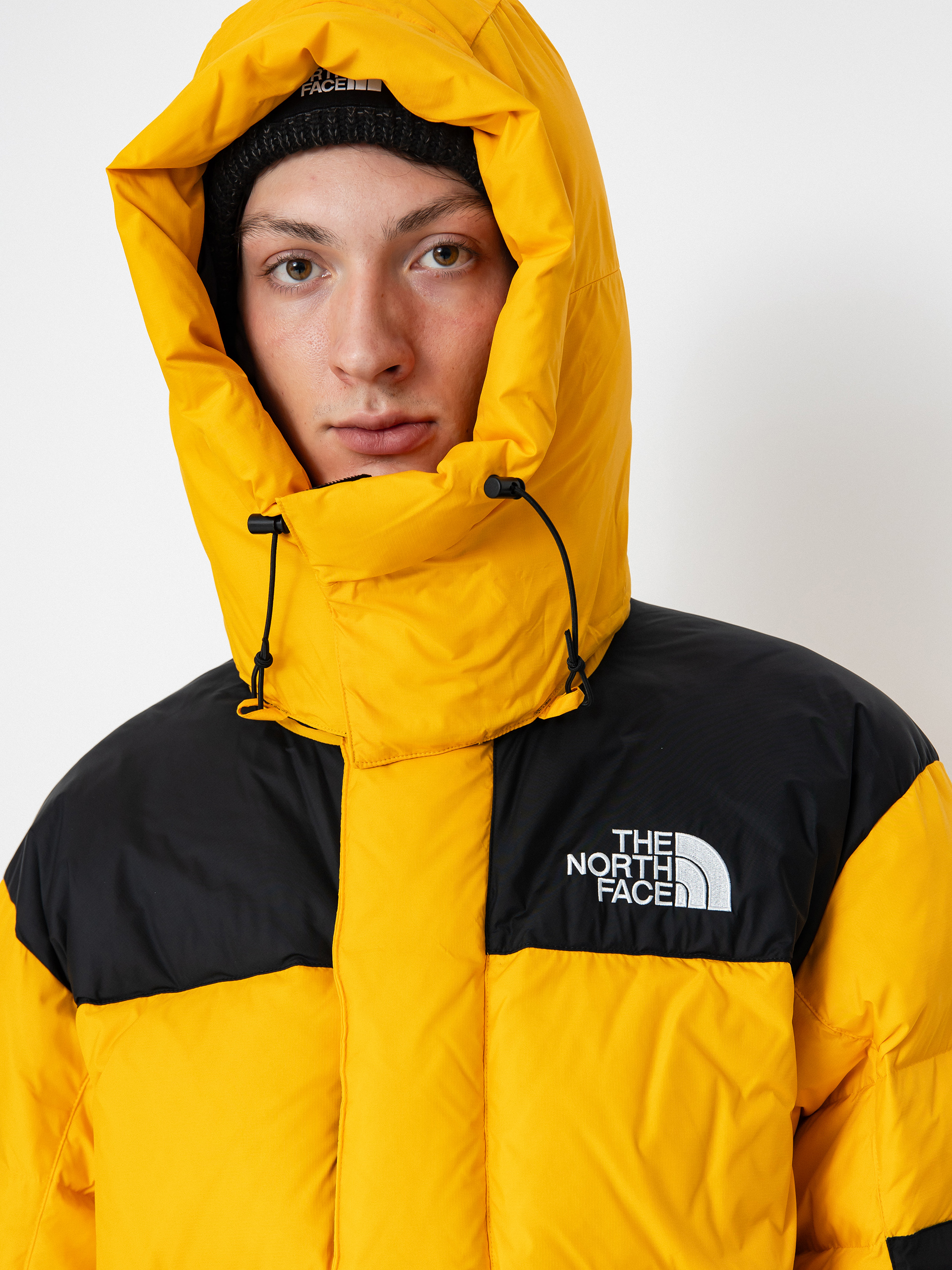 The North Face Hmlyn Baltoro Jacket (summit gold tnf black n)