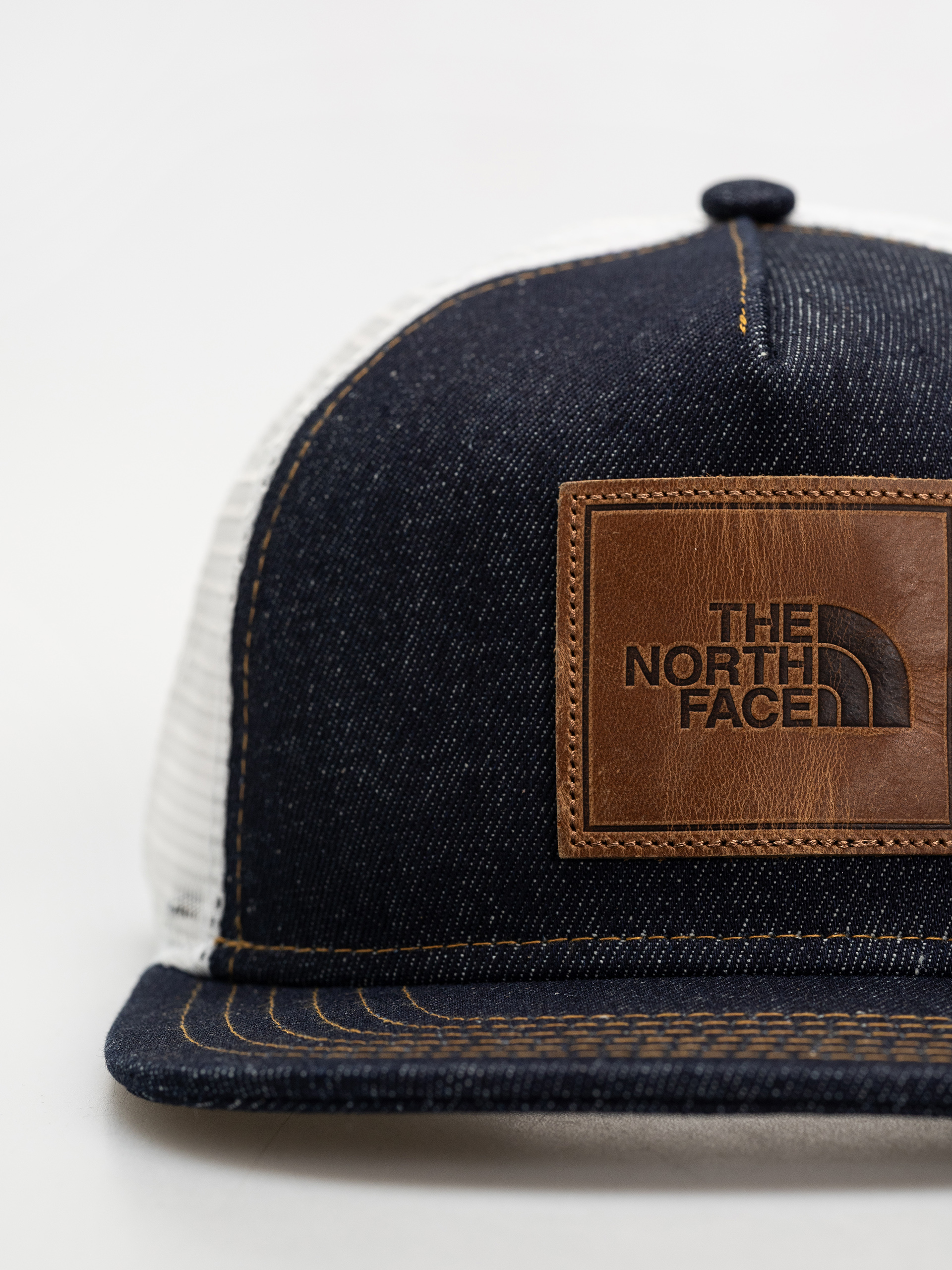 The North Face Half Dome Trucker Cap (denim/leather patch)