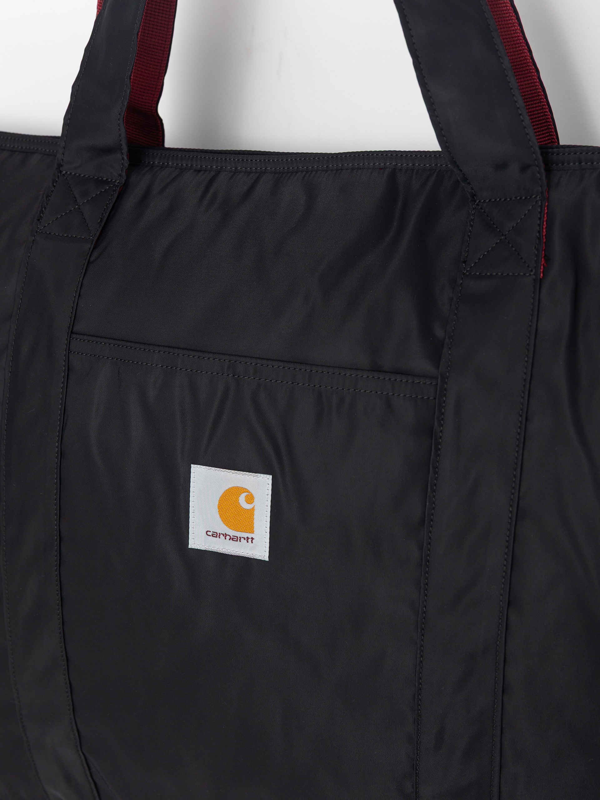 Carhartt WIP Schultertasche Alumni Tote (black/scarlet)