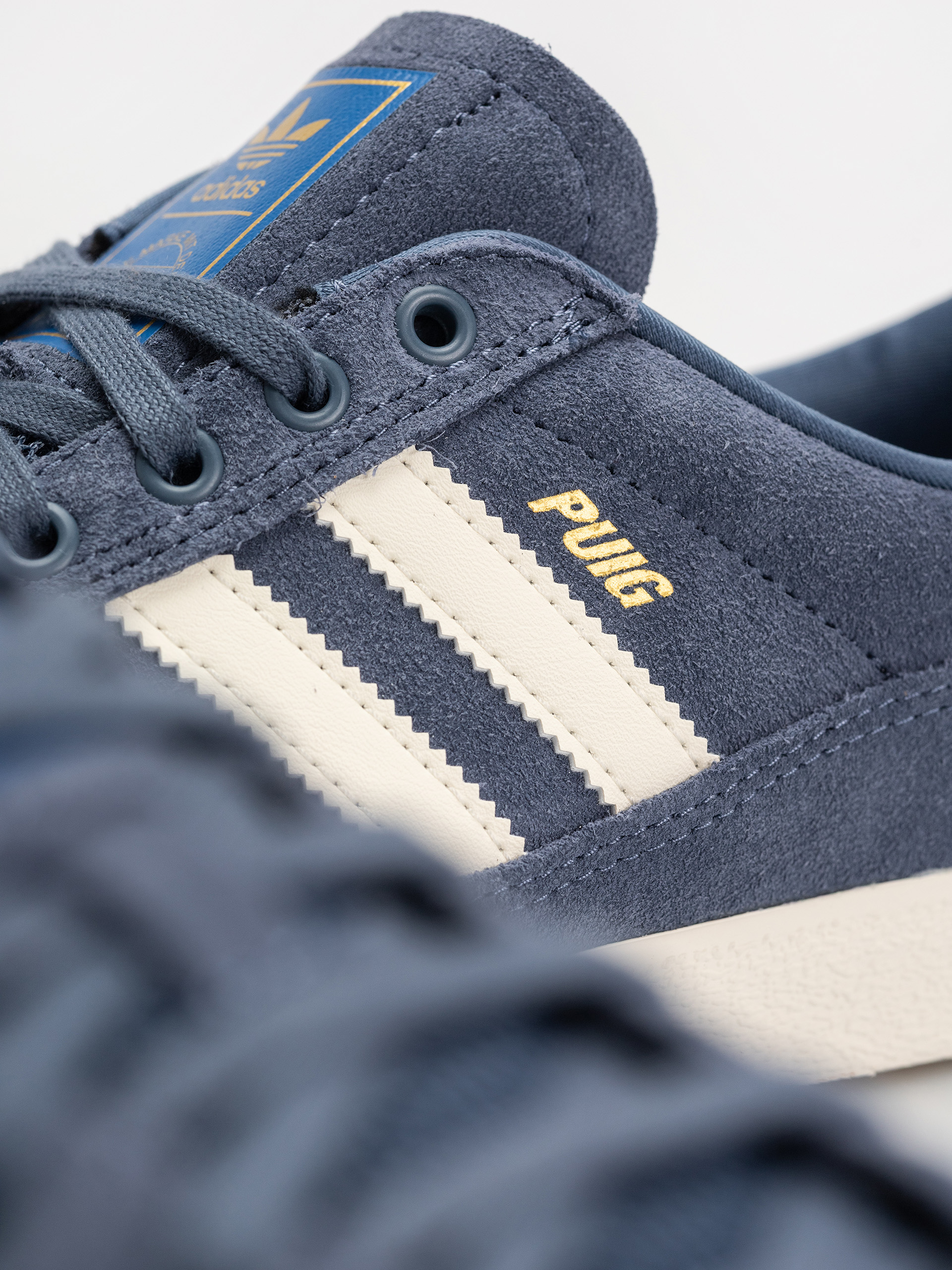 adidas Puig Indoor Schuhe (prloin/owhite/blubir)