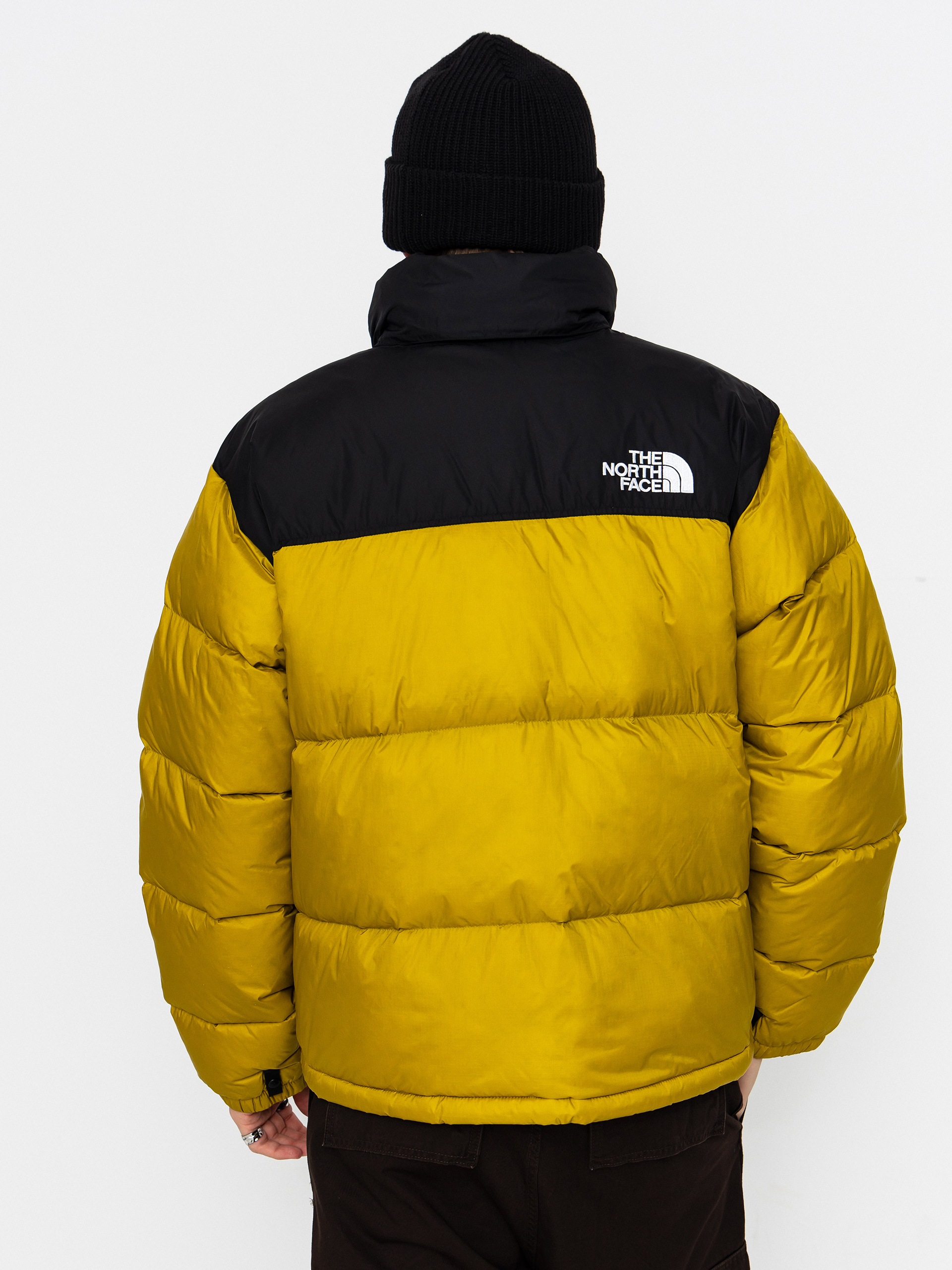 The North Face 1996 Retro Nuptse Jacke (deep dijon/tnf black)