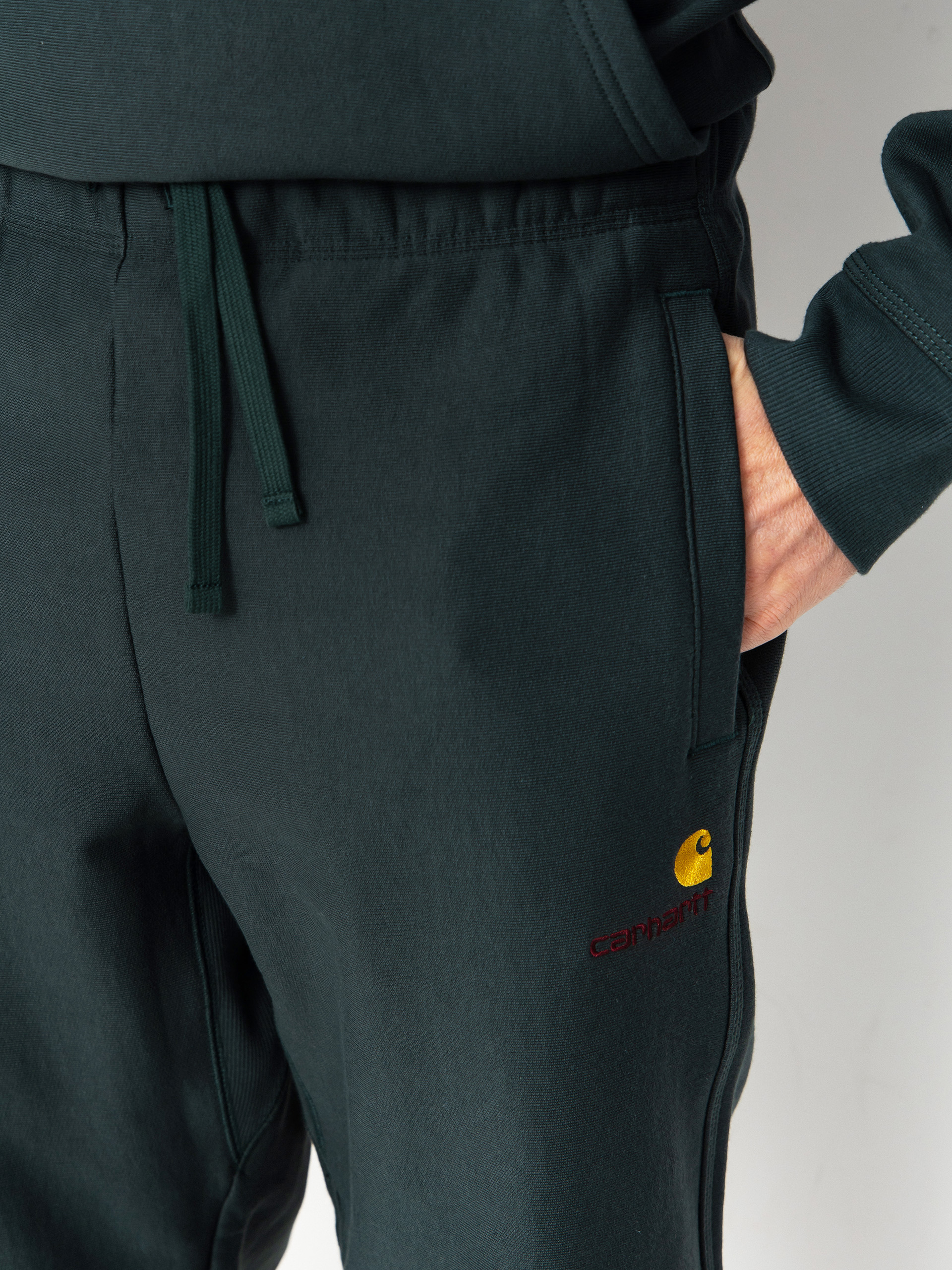 Carhartt WIP American Script Jogging Pants (kale green)