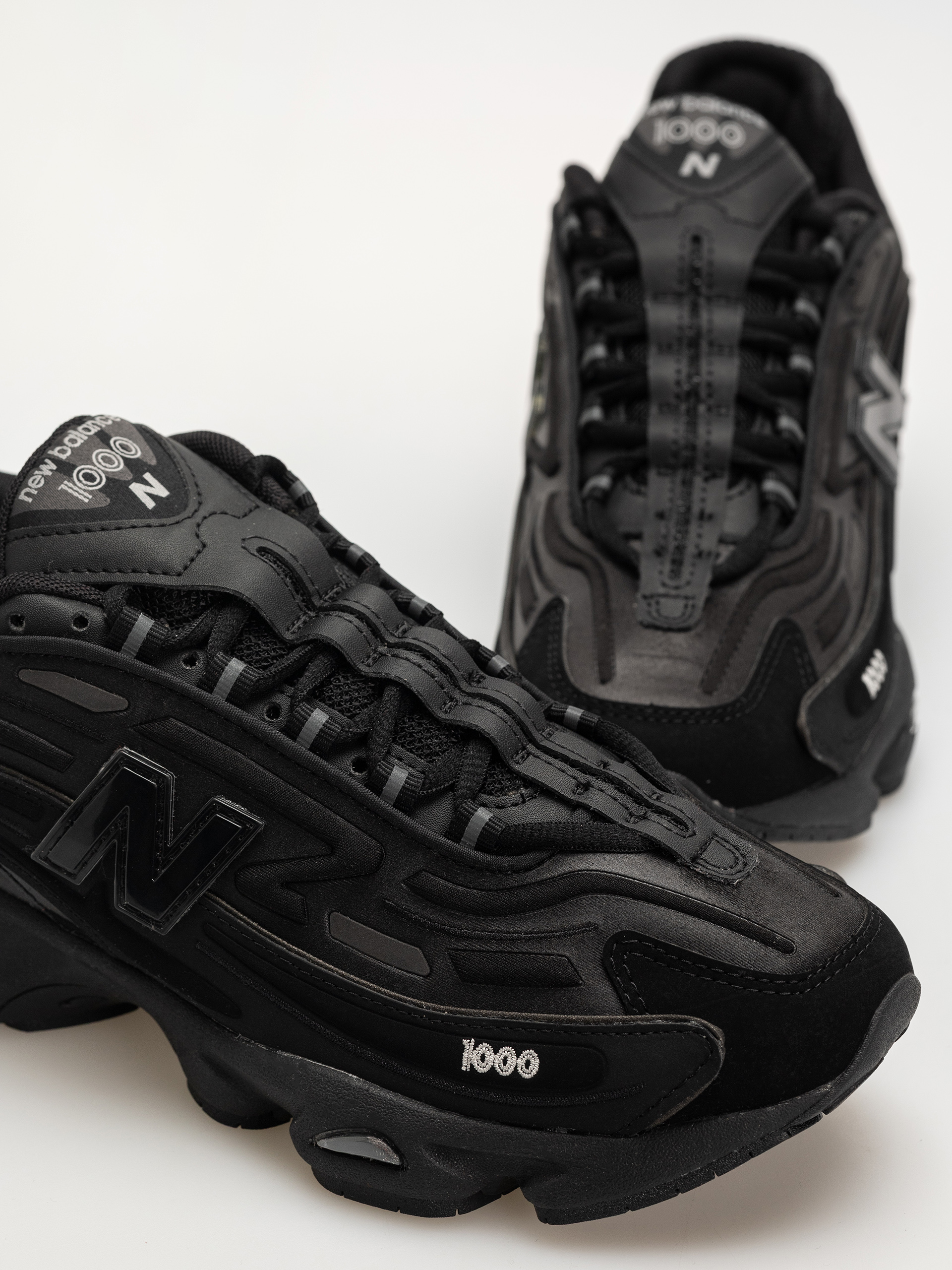 New Balance 1000 Schuhe (black/black metallic/light gold metallic b)