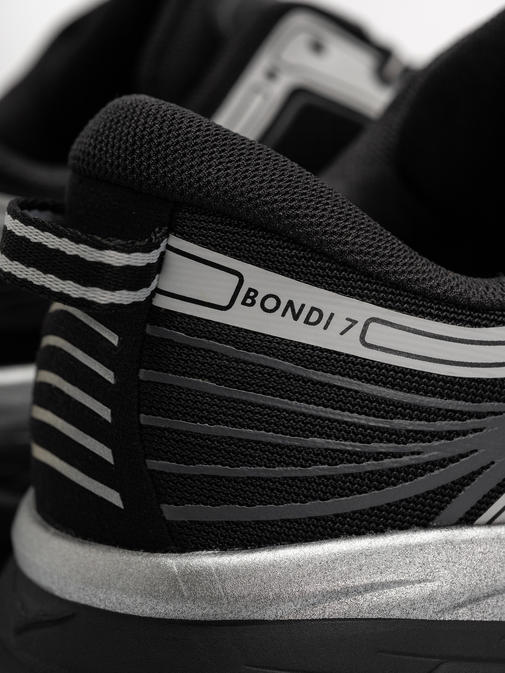 Hoka Bondi 7 Schuhe (black/stardust)