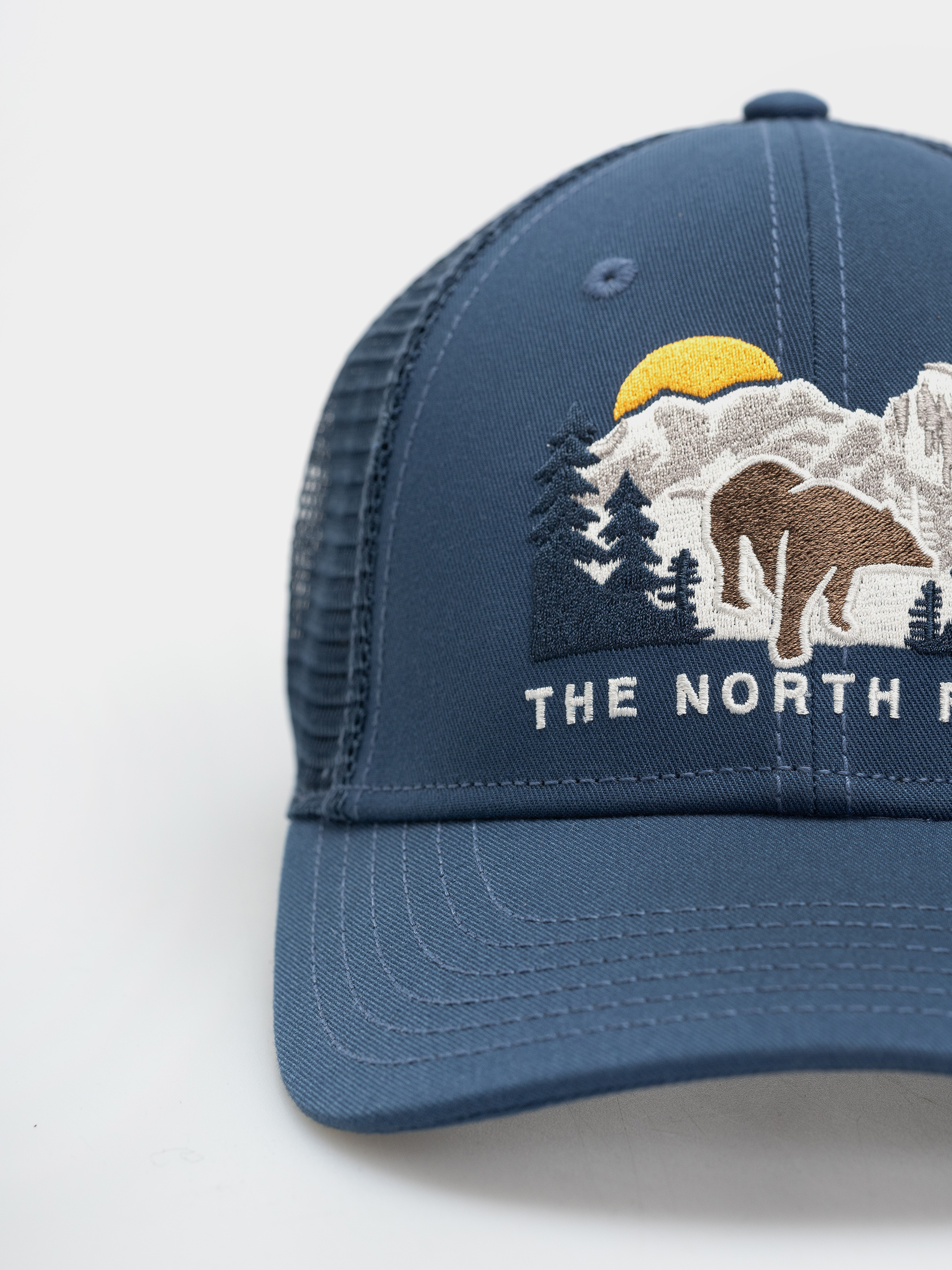 The North Face Embroidered Mudder Trucker Cap (shdbu/beargrphc)