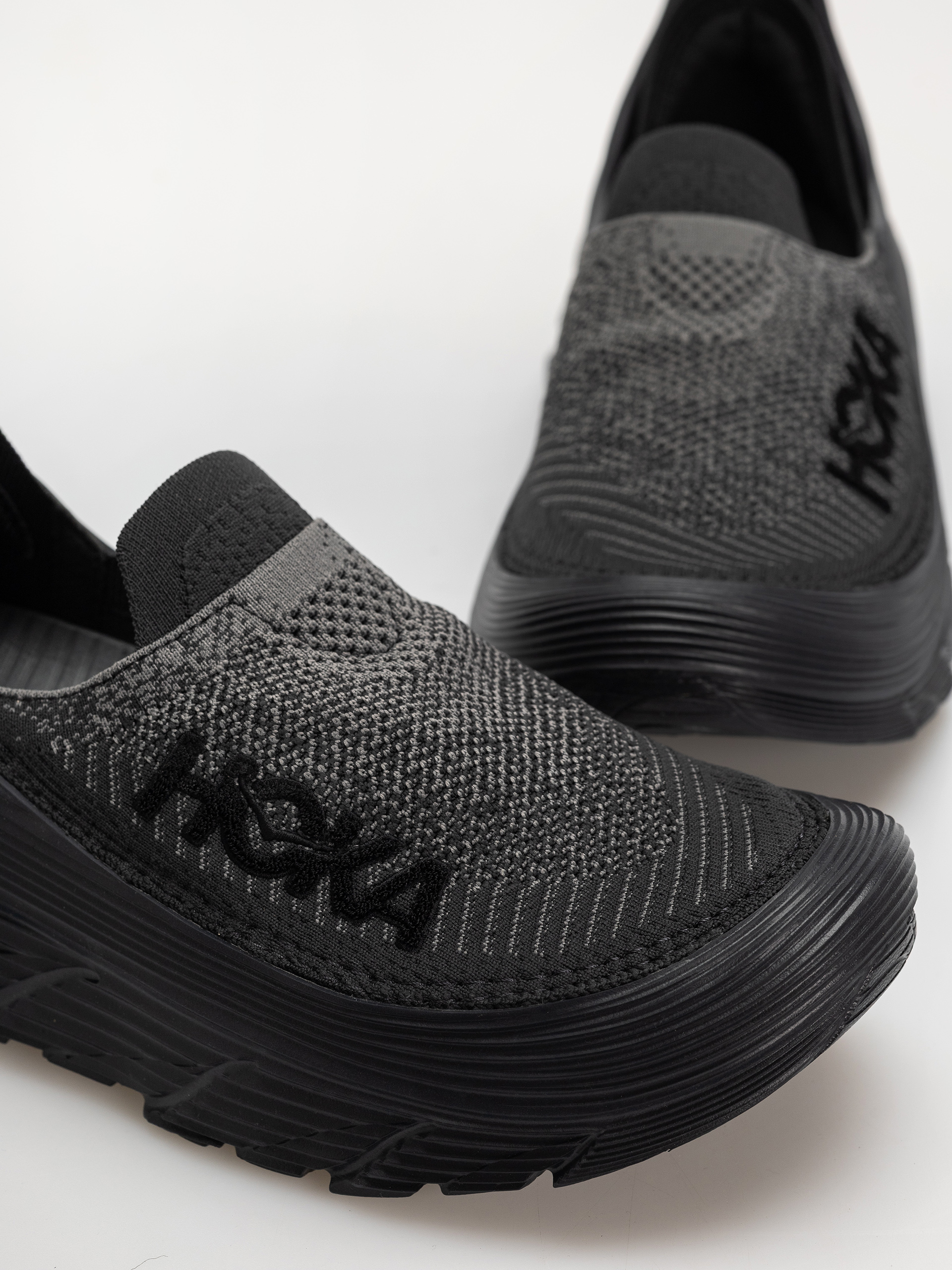 Hoka Schuhe Restore TC (black/black)