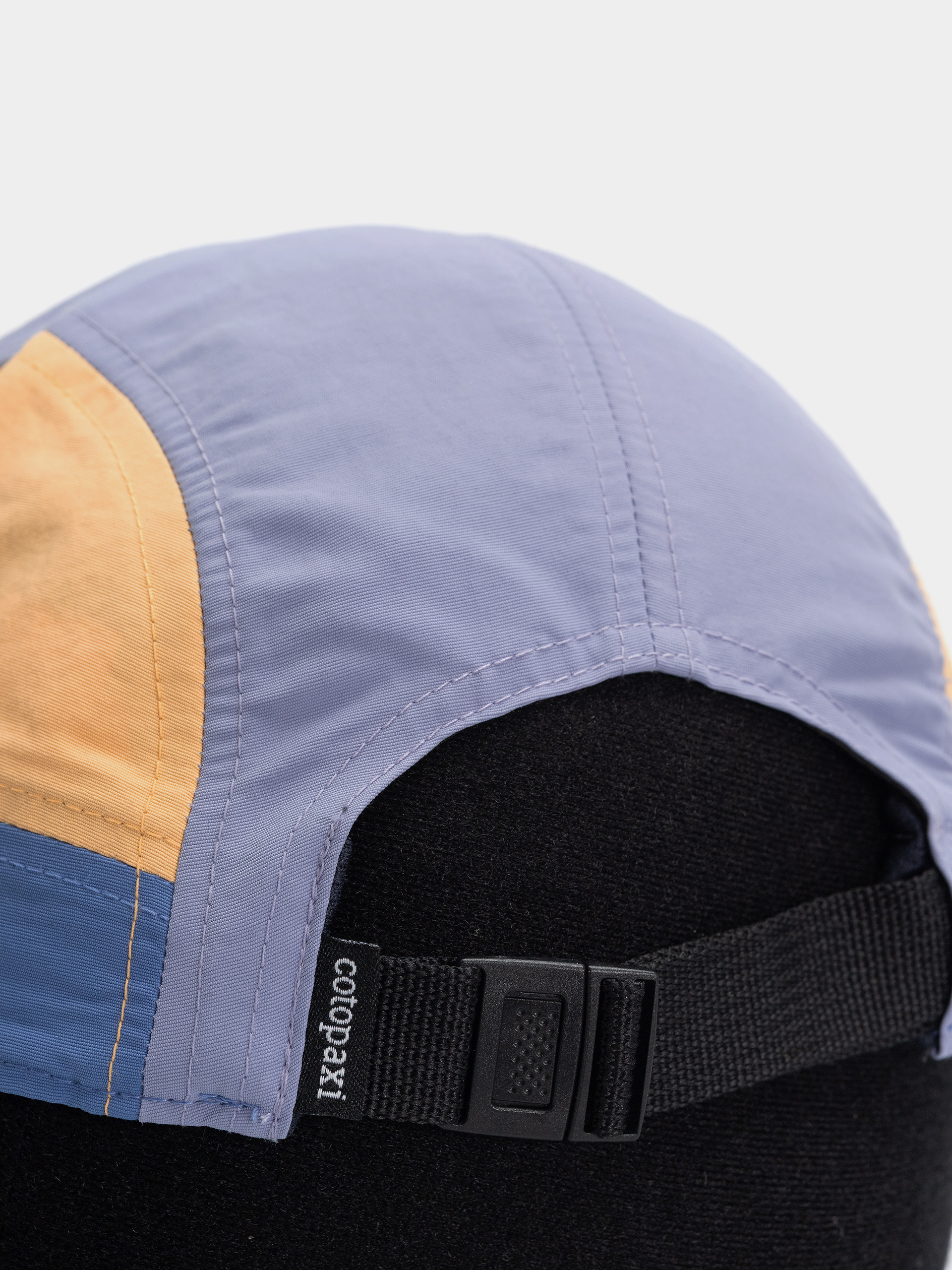 Cotopaxi Tech Cap (grapefruit and aster)