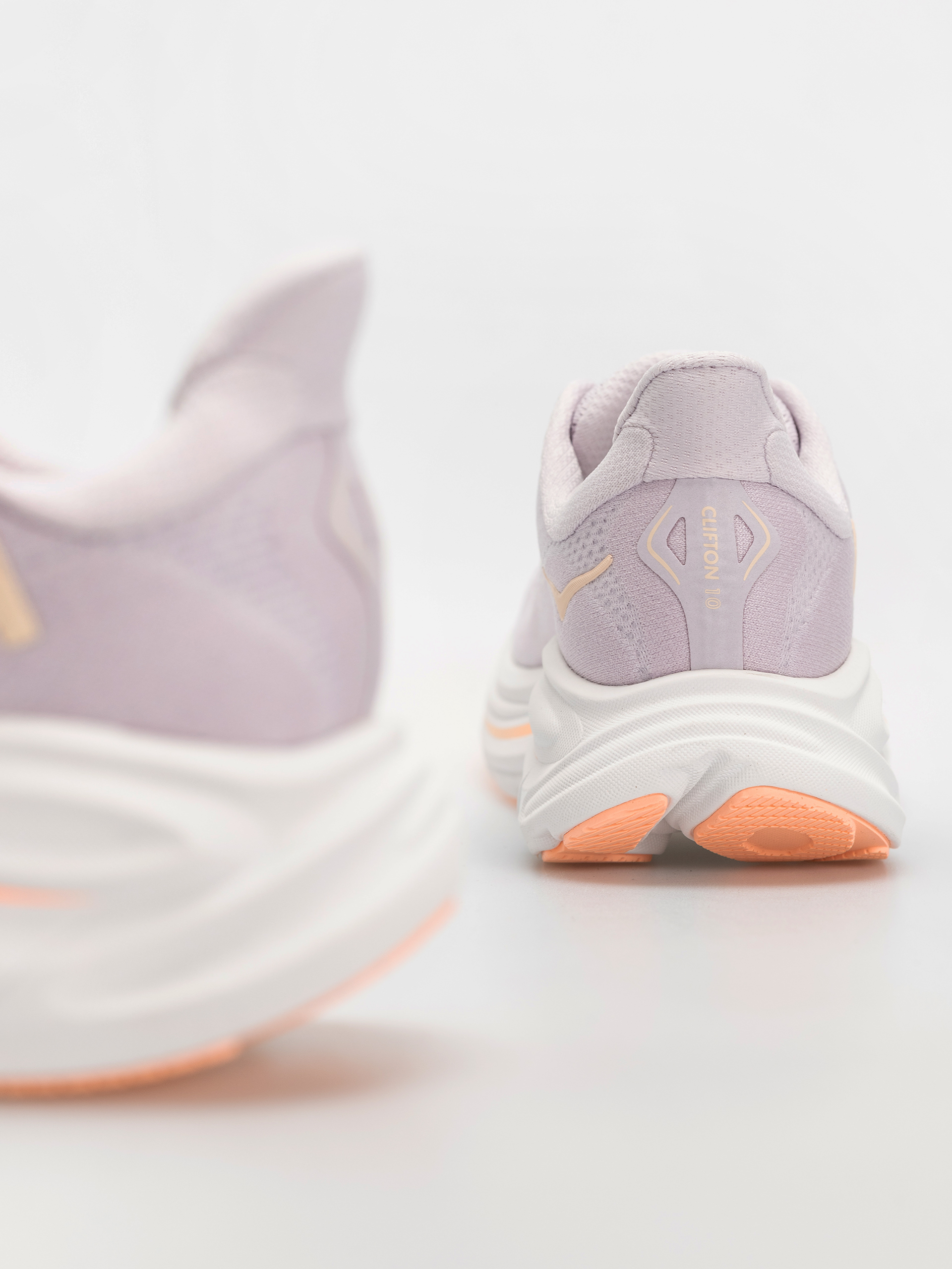 Hoka Clifton 10 Wmn Schuhe (lilac cream/tangerine glow)